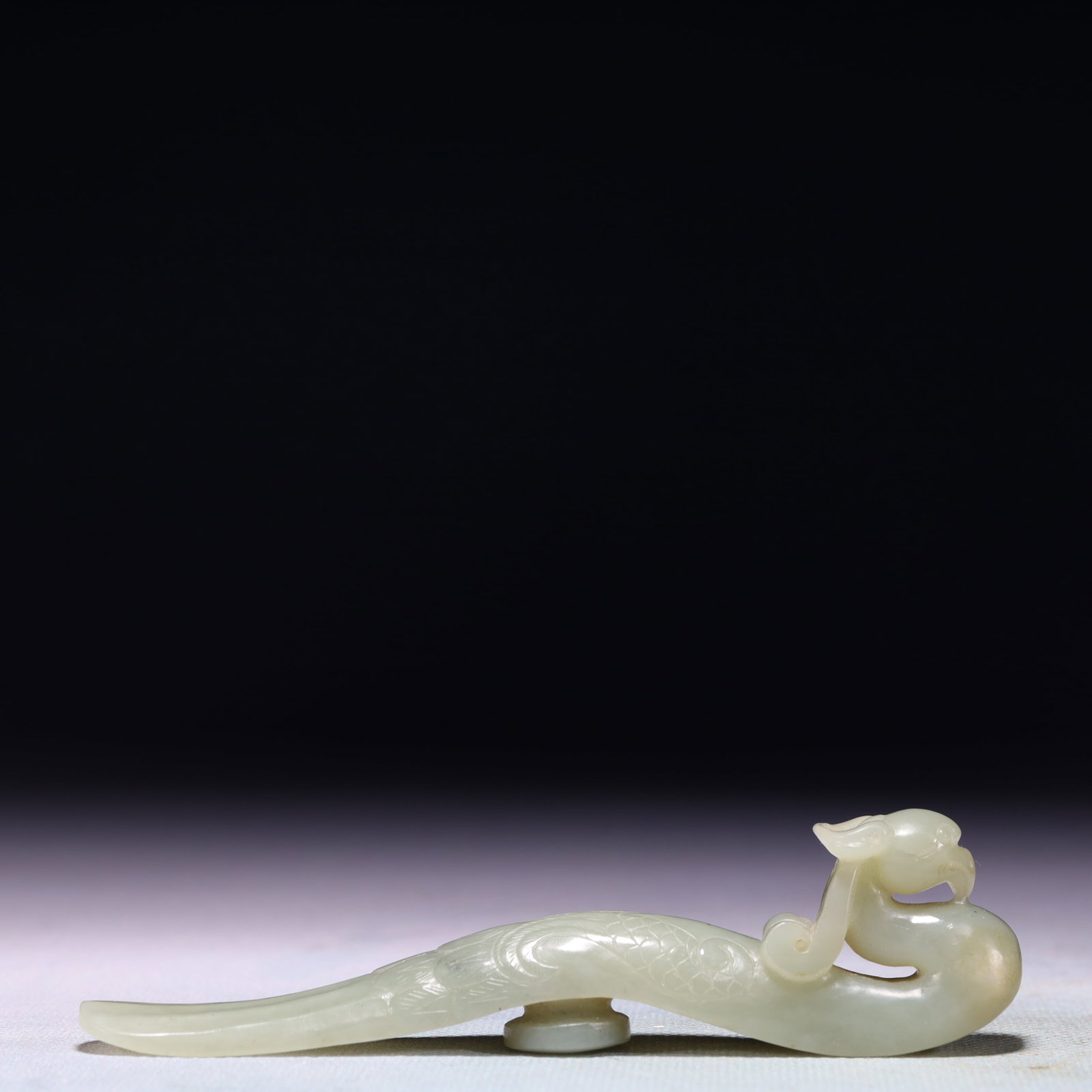 An Exquisite White Jade Phoenix Ruyi: An Exquisite White Jade Phoenix Ruyi,Qing Dynasty,China,Size:4.7inx0.8inx1.2in,Weight:65.7g 白玉凤如意,中国清代