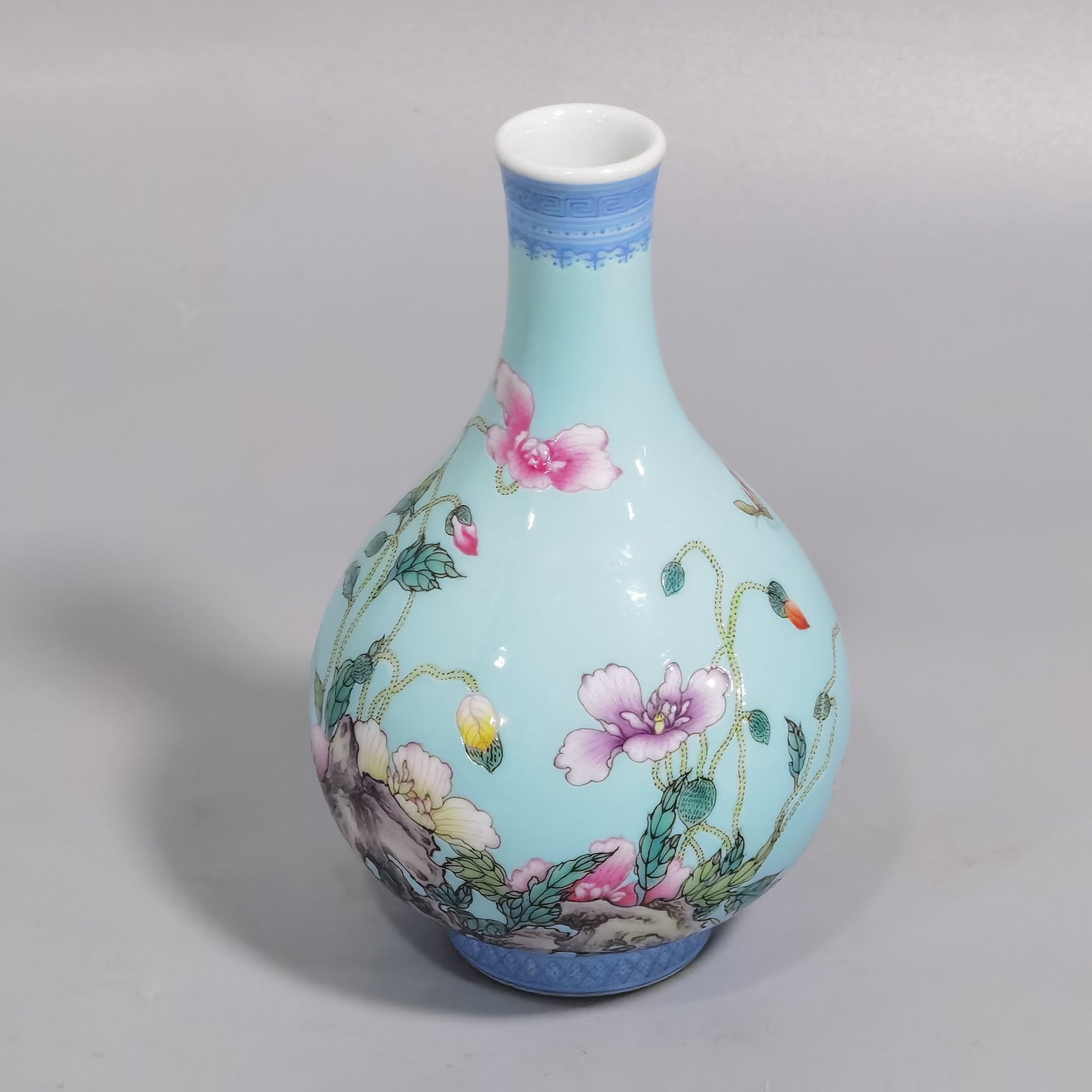 An Exquisite Turquoise Glazed Enamel Flower and Butterfly Pattern Vase,with poem: An Exquisite Turquoise Glazed Enamel Flower and Butterfly Pattern Vase,with poem,Qing Dynasty,China,Yongzheng Four-character Mark,Size:4.9inx3.1in 松石绿釉珐琅ô