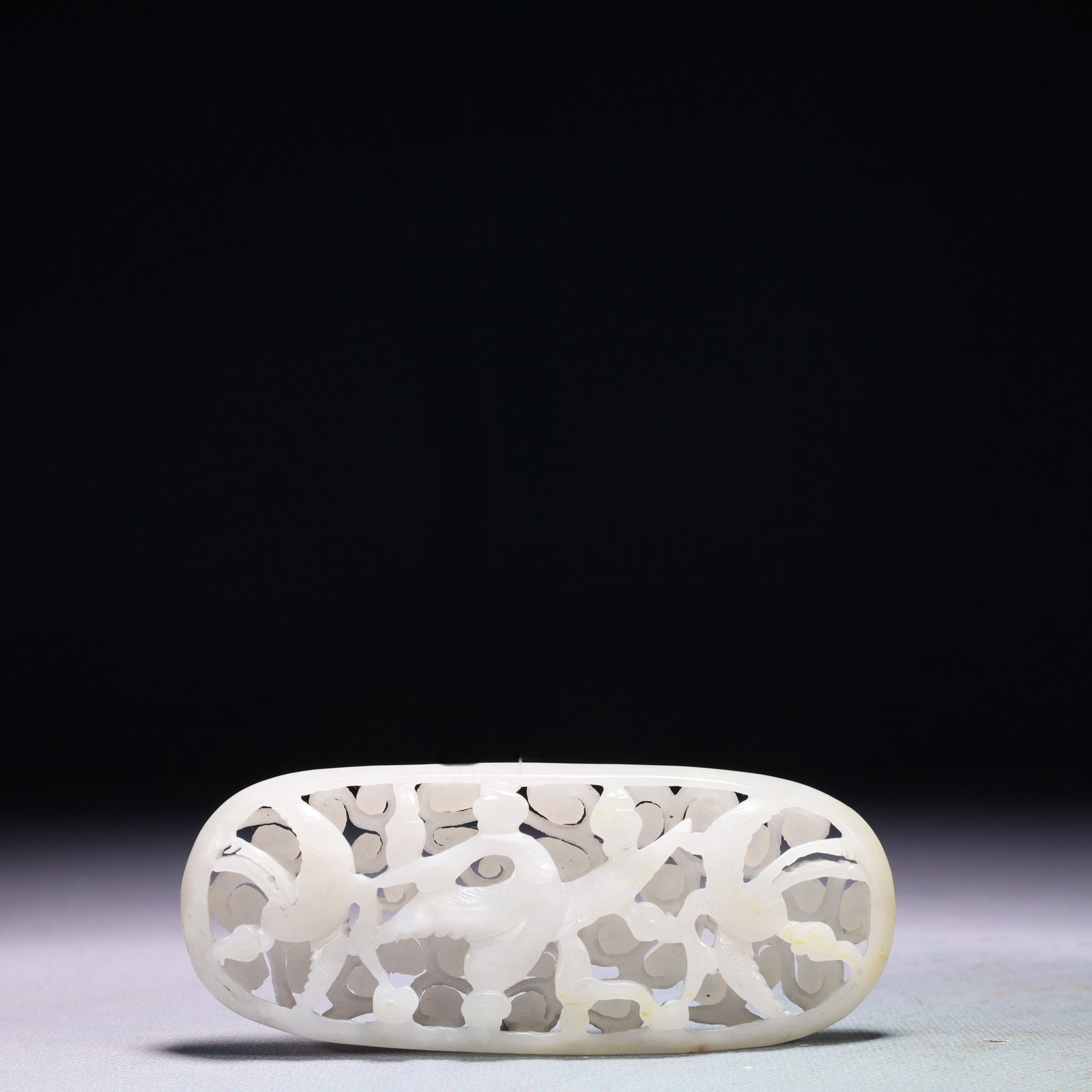 An Exquisite White Jade Auspicious Cloud and Phoenix Pattern Pendant: An Exquisite White Jade Auspicious Cloud and Phoenix Pattern Pendant,Qing Dynasty,China,Size:4.1inx1.6in,Weight:71.2g