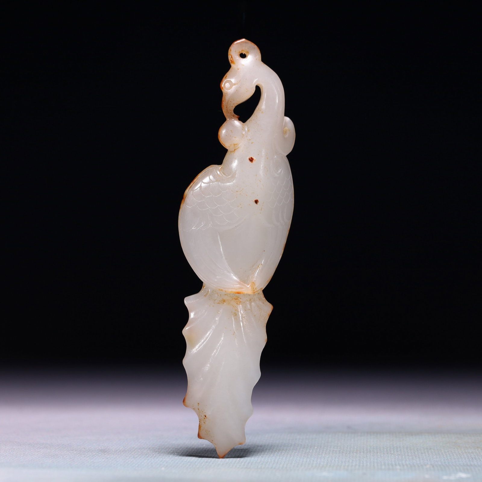 An Exquisite White Jade Phoenix Pendant: An Exquisite White Jade Phoenix Pendant,Qing Dynasty,China,Size:1.4inx0.8inx5.1in,Weight:71.7g 白玉凤挂件,中国清代