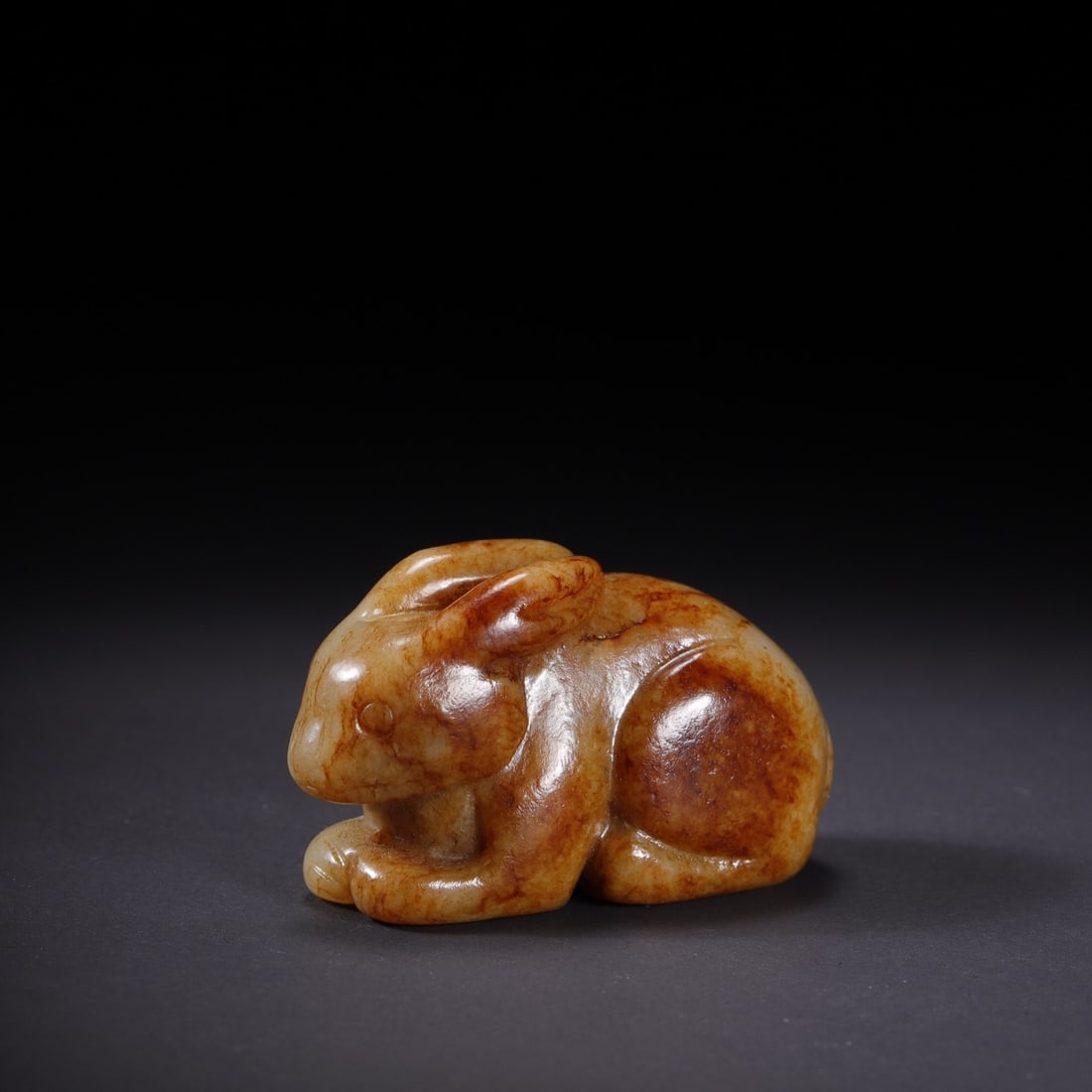 An Exquisite White Jade Rabbit Hand Piece: An Exquisite White Jade Rabbit Hand Piece,Qing Dynasty,China,Size:1.8inx0.9inx1.1in,Weight:44g