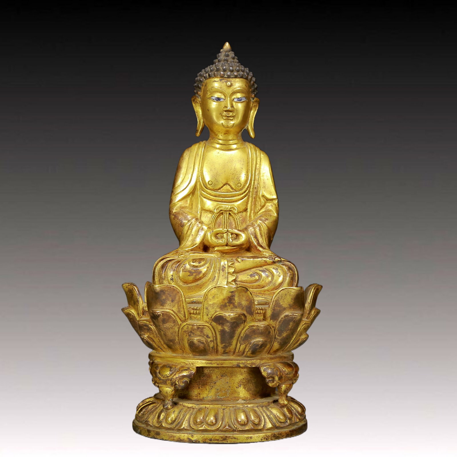 A Solemn Gilt Bronze Statue of Sakyamuni: A Solemn Gilt Bronze Statue of Sakyamuni,Ming Dynasty, China,Size:5.1inx10.2in,Weight:2050g 铜鎏金释迦摩尼像，明代