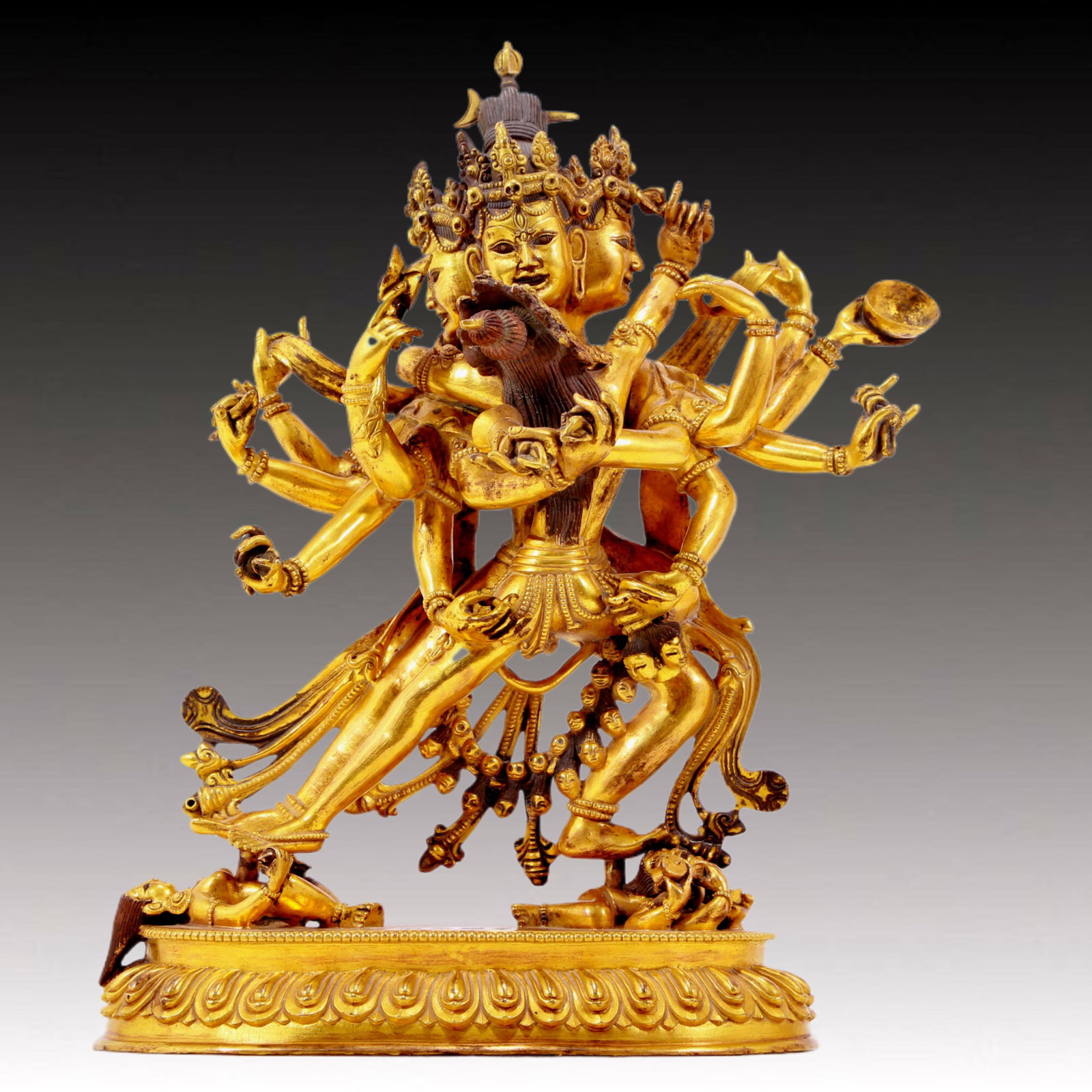 A majestic gilt bronze statue of the joyful Buddha: solemn gilt bronze statue of the Happy Buddha, Yongle six-character mark, Ming Dynasty, China, Size: 8.3inx4.7inx11.8in Weight: 4690g 铜鎏金欢喜佛像，&#