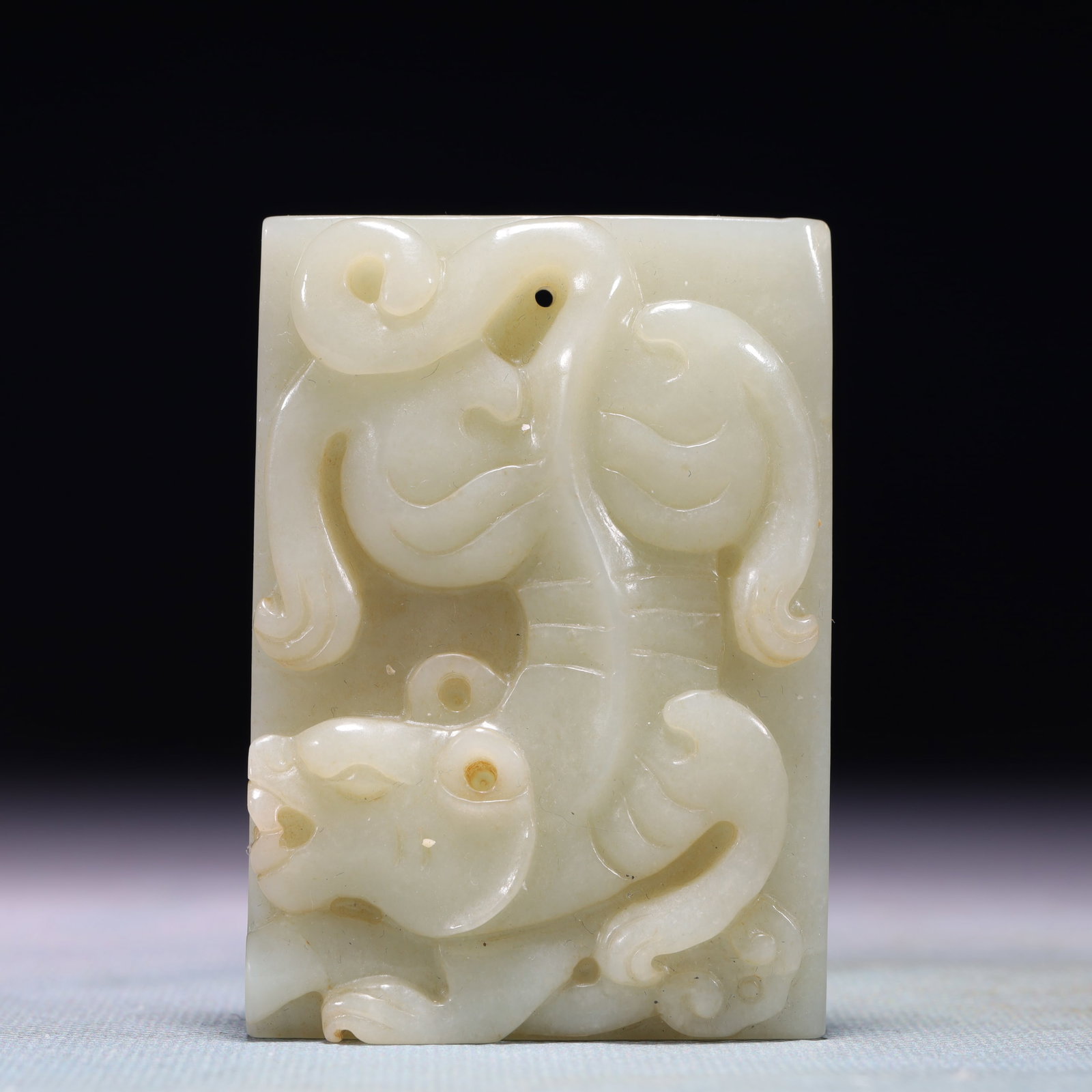 An Exquisite White Jade Tiger Patten Pendant: An Exquisite White Jade Tiger Patten Pendant,Qing Dynasty,China,Size:2.2inx3in,Weight:106.7g 白玉虎纹牌,中国清代