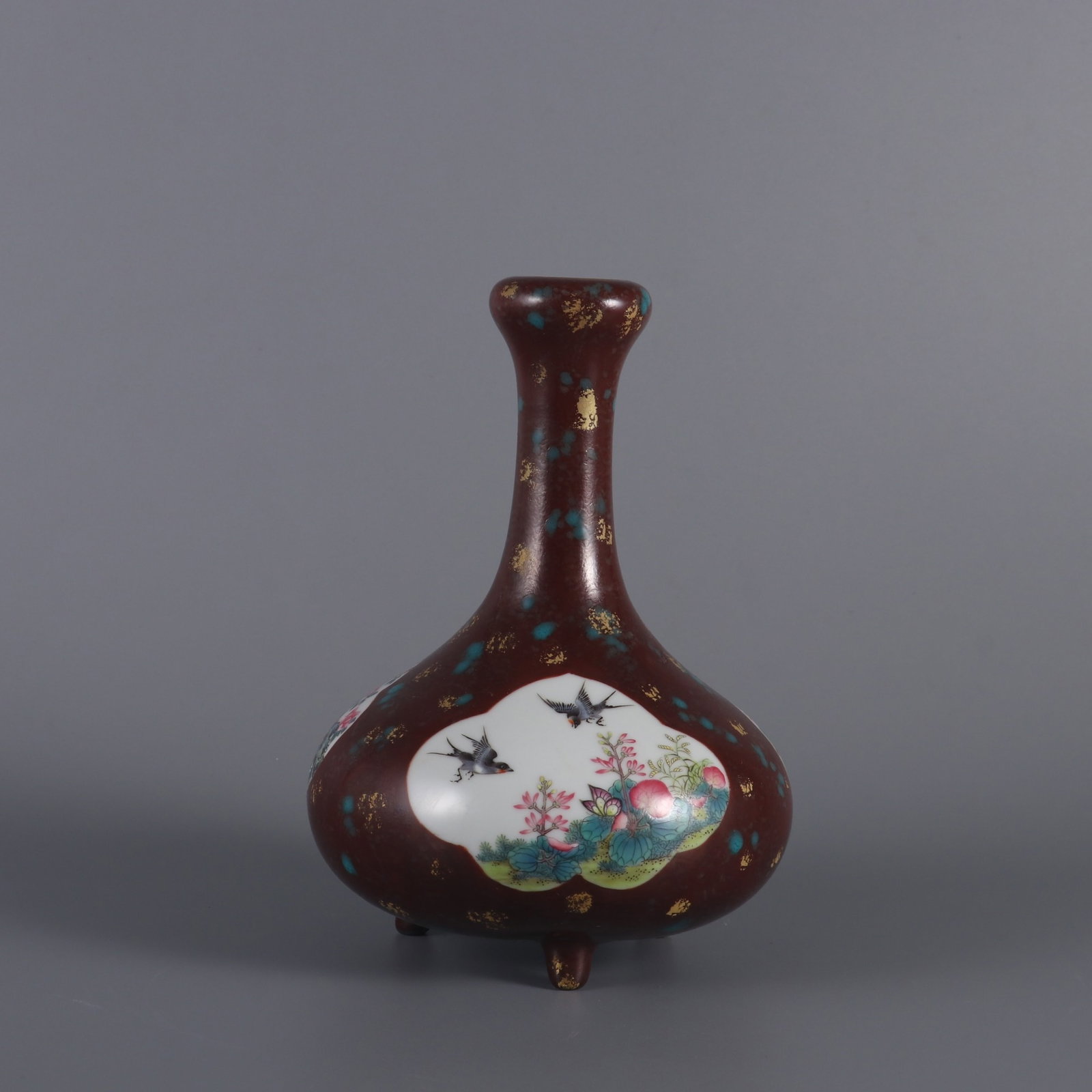 An Exquisite Bronze Glazed Flower and Bird Pattern Tripod Vase: An Exquisite Bronze Glazed Flower and Bird Pattern Tripod Vase,Qing Dynasty,China,Qianlong Six-character Mark,Size:7.3inx5.1in 古铜彩花鸟纹三足瓶,