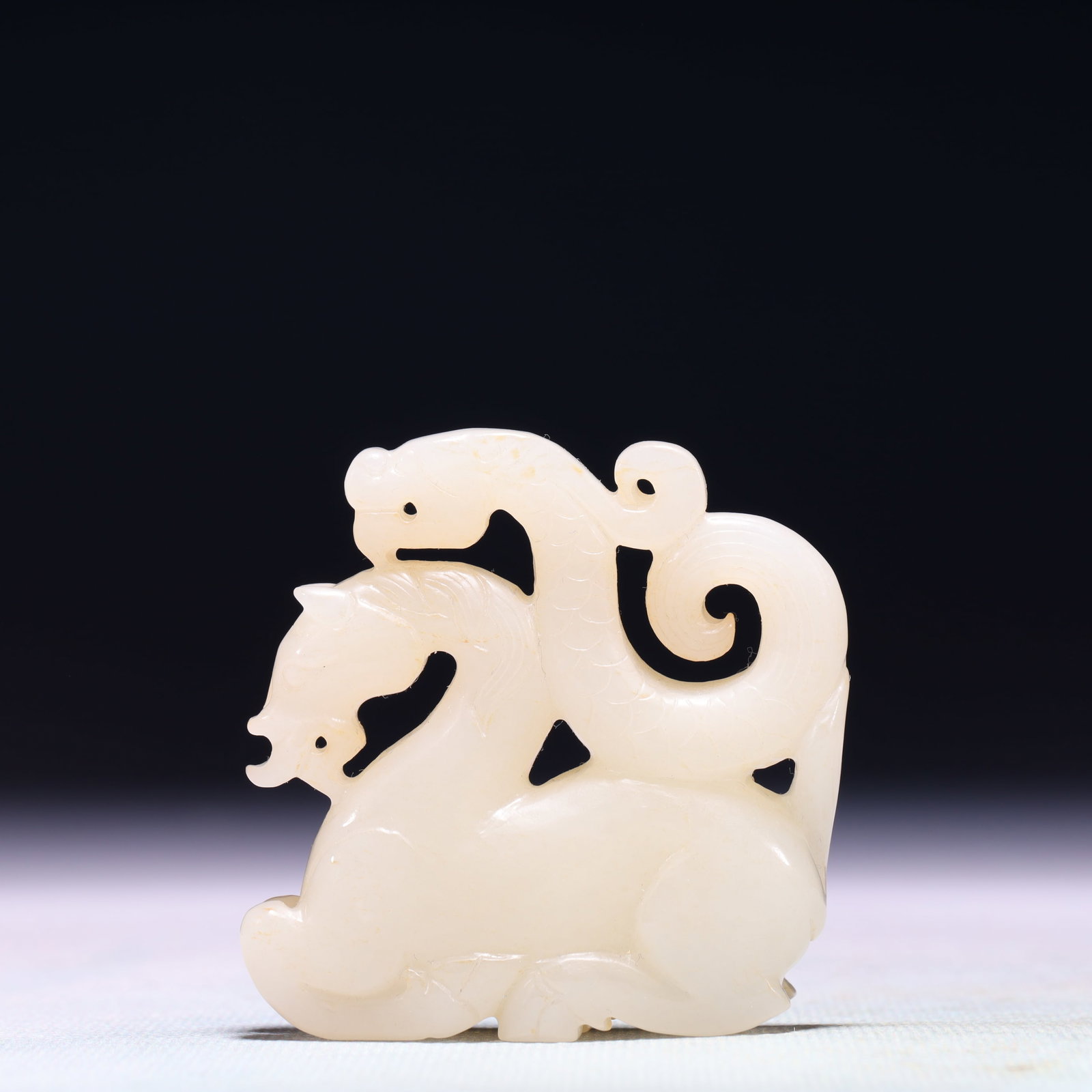 An Exquisite White Jade Horse Ornament: An Exquisite White Jade Horse Ornament,Qing Dynasty,China,Size:2.2inx0.6inx2.4in,Weight:91.1g 白玉骏马摆件,中国清代