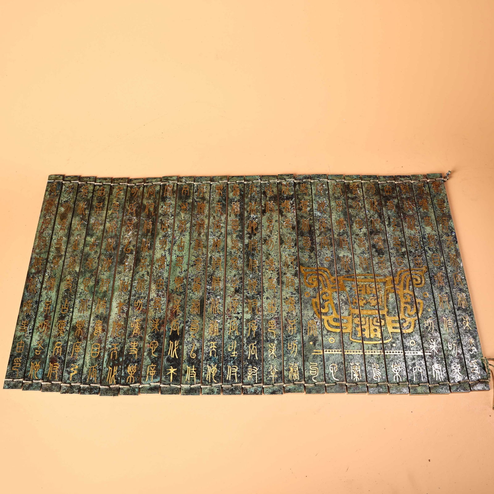 An Exquisite Bronze Ornament,With Inscription: An Exquisite Bronze Ornament,With Inscription,the Warring States period in China,Size:19.7inx11in,Weight:1600g 青铜摆件,带铭文,中国战国