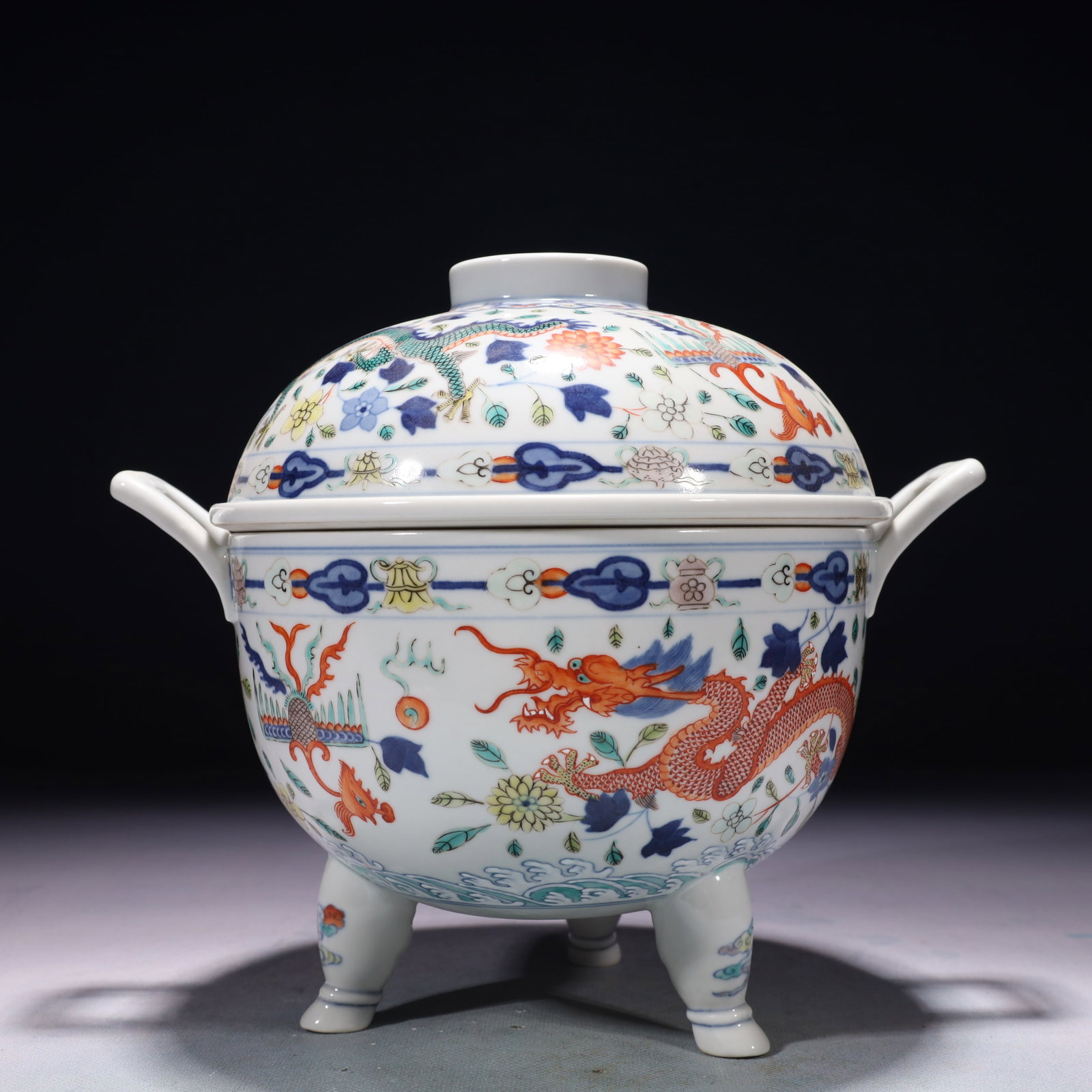 An Exquisite Blue and White Wucai Dragon and Phoenix Pattern Double-Ears and Tripod Censer (1 of 15)