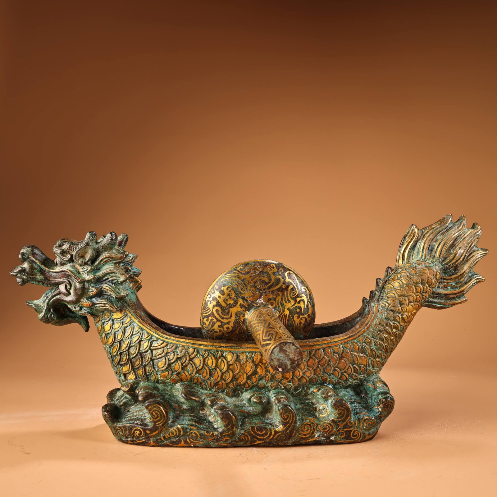 An Exquisite Bronze Inlaid Gold Dragon Ornament,With Inscription: An Exquisite Bronze Inlaid Gold Dragon Ornament,With Inscription,the Warring States period in China,Size:7.1inx16.5in,Weight:5300g 青铜错金龙摆件,带&
