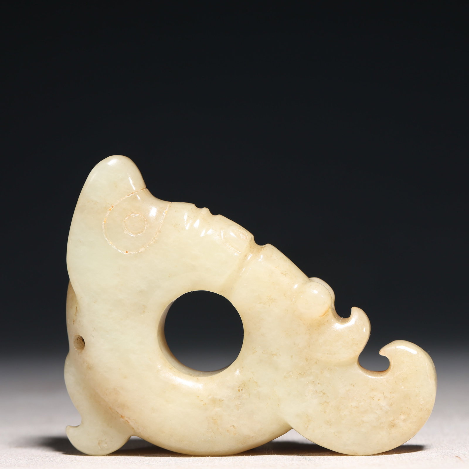 An Archaic Hongshan Culture White Jade Pendant: An Archaic Hongshan Culture White Jade Pendant,Ancient Time, China,Size:2.4inx0.7inx3.5in,Weight:142g