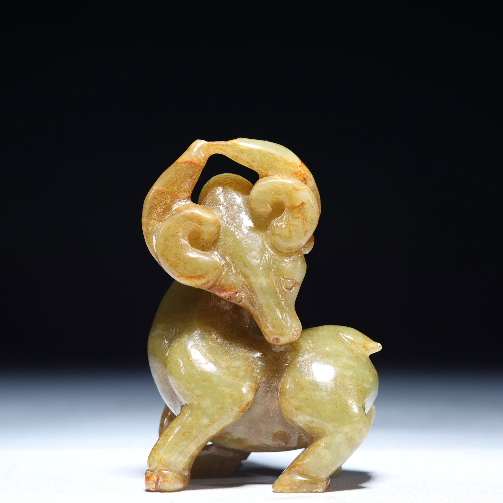 An Exquisite Yellow Jade Sheep Ornament: An Exquisite Yellow Jade Sheep Ornament,Qing Dynasty,China,Size:2inx1.4inx3.1in,Weight:200g 黄玉羊摆件,中国清代