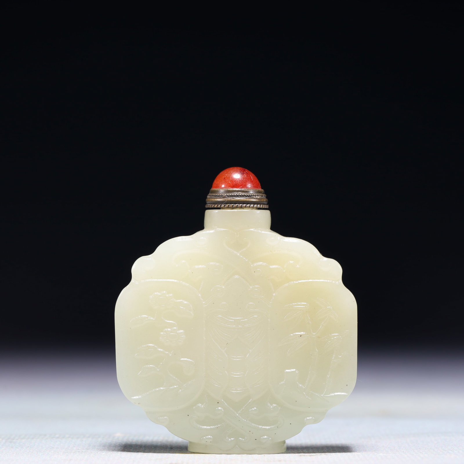 An Exquisite White Jade Plum Blossom,Orchid Bamboo and Chrysanthemum Pattern Snuff Bottle: An Exquisite White Jade Plum Blossom,Orchid Bamboo and Chrysanthemum Pattern Snuff Bottle,Qing Dynasty,China,Size:2inx0.5inx2.4in,Weight:70.9g 白玉梅兰竹菊纹&