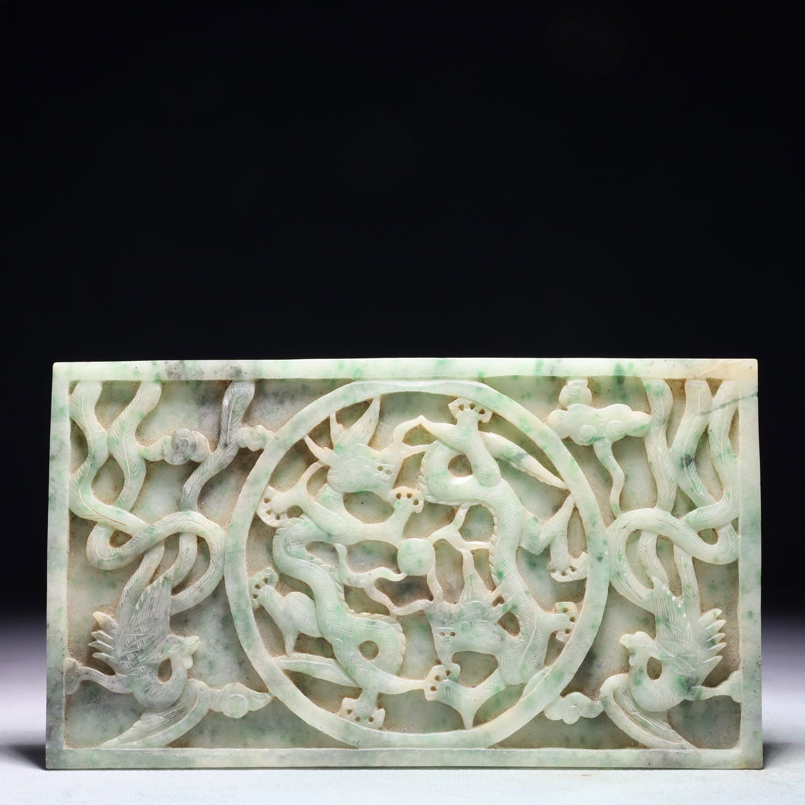 An Exquisite Jadeite Dragon and Phoenix Pattern Pendant: An Exquisite Jadeite Dragon and Phoenix Pattern Pendant,Qing Dynasty,China,Size:7.5inx4.1in,Weight:396.3g 翡翠龙凤纹佩,中国清代