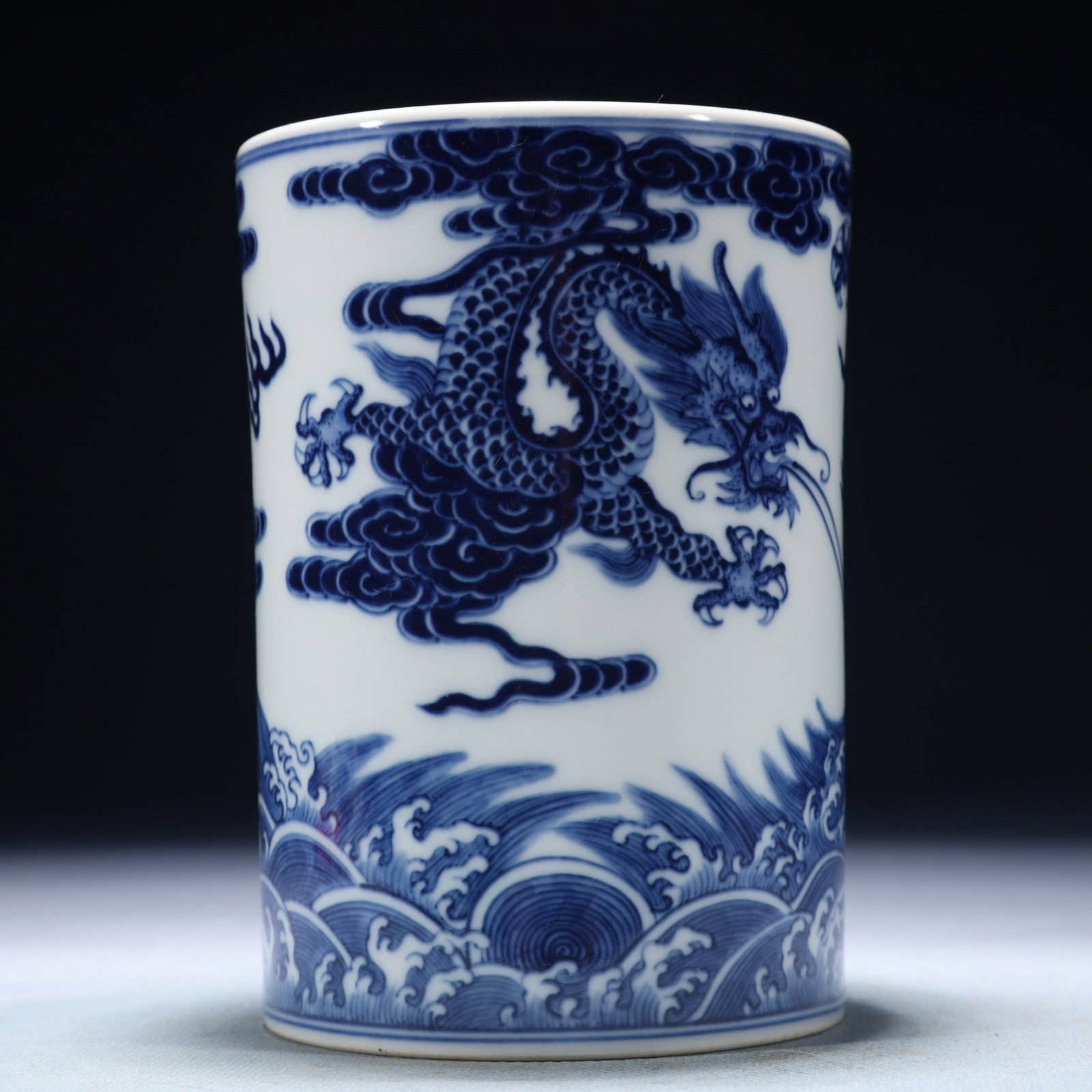 An Exquisite Blue and White Seawater and Dragon Pattern Brush Pot: An Exquisite Blue and White Seawater and Dragon Pattern Brush Pot,Qing Dynasty,China,Yongzheng Six-character Mark,Size:3.7inx1.4in,Weight:450g 青花海水龙纹笔&