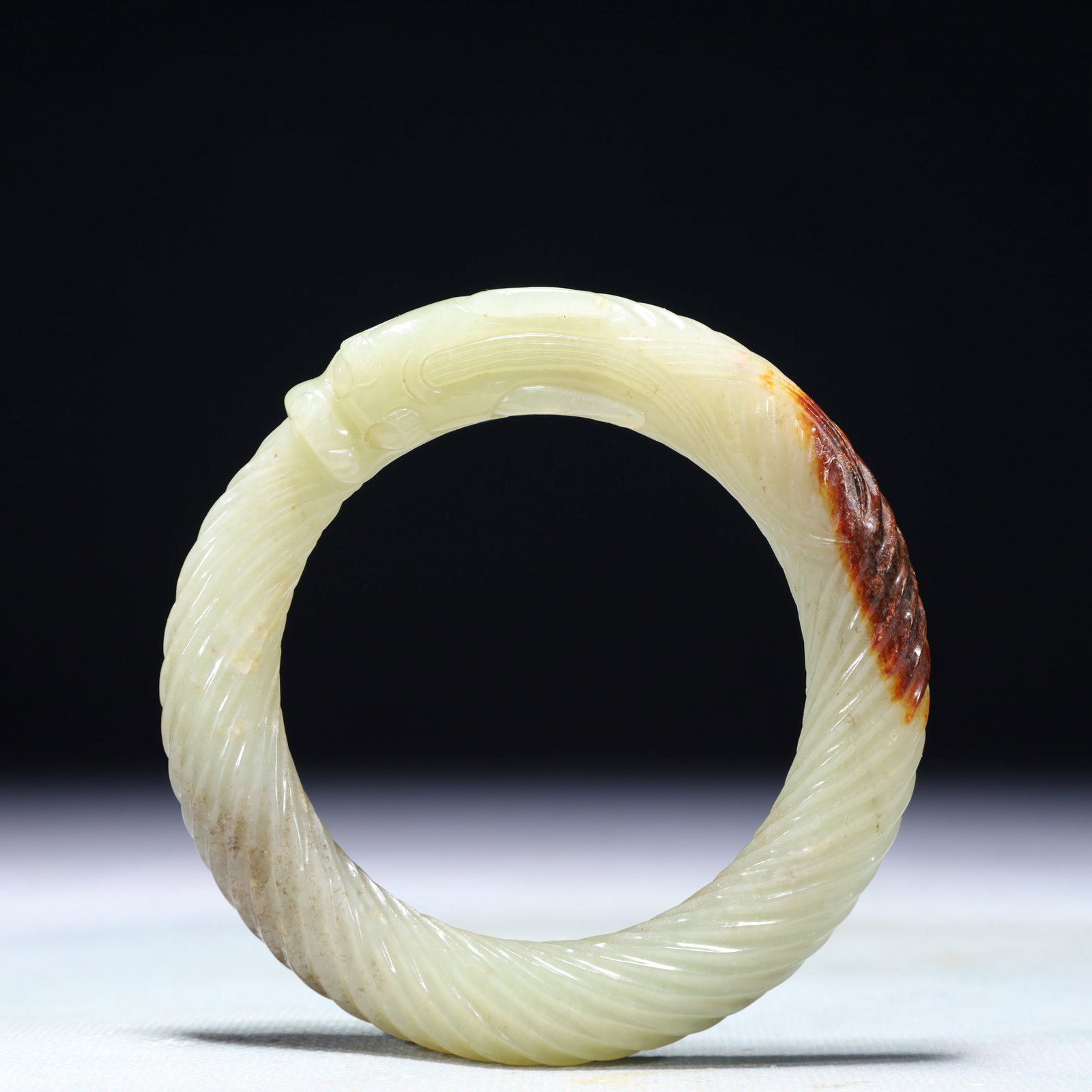 An Exquisite White Jade Dragon Pattern Bracelet: An Exquisite White Jade Dragon Pattern Bracelet,Qing Dynasty,China,Size:0.6inx2.6in,Weight:83.3g 白玉龙纹手镯,中国清代