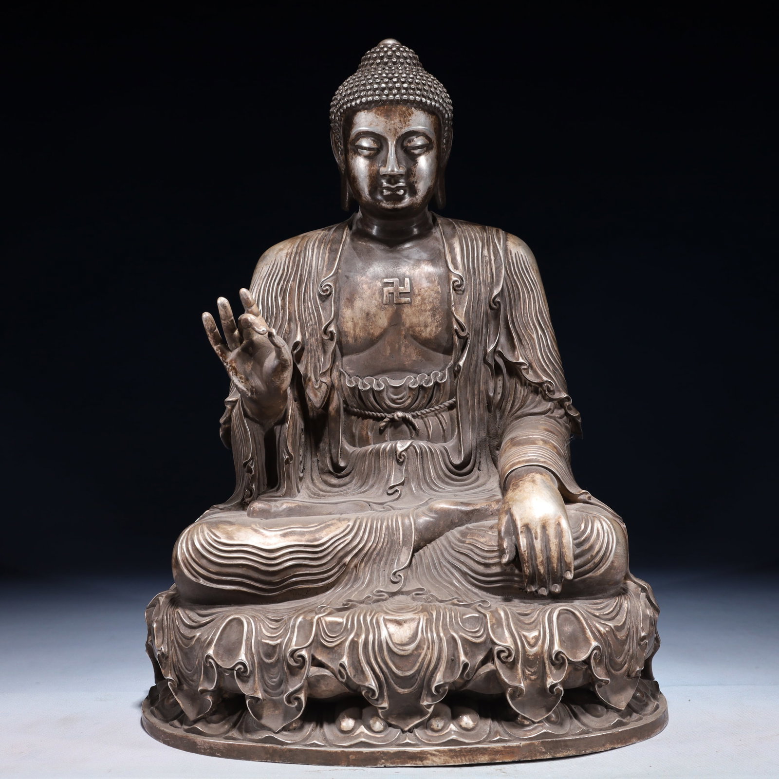 A Solemn Silver-plated Bronze Statue of Sakyamuni: A Solemn Silver-plated Bronze Statue of Sakyamuni,Qing Dynasty,China,Size:11.8inx9.4inx16.5in,Weight:6600g 铜镀银如来像,中国清代
