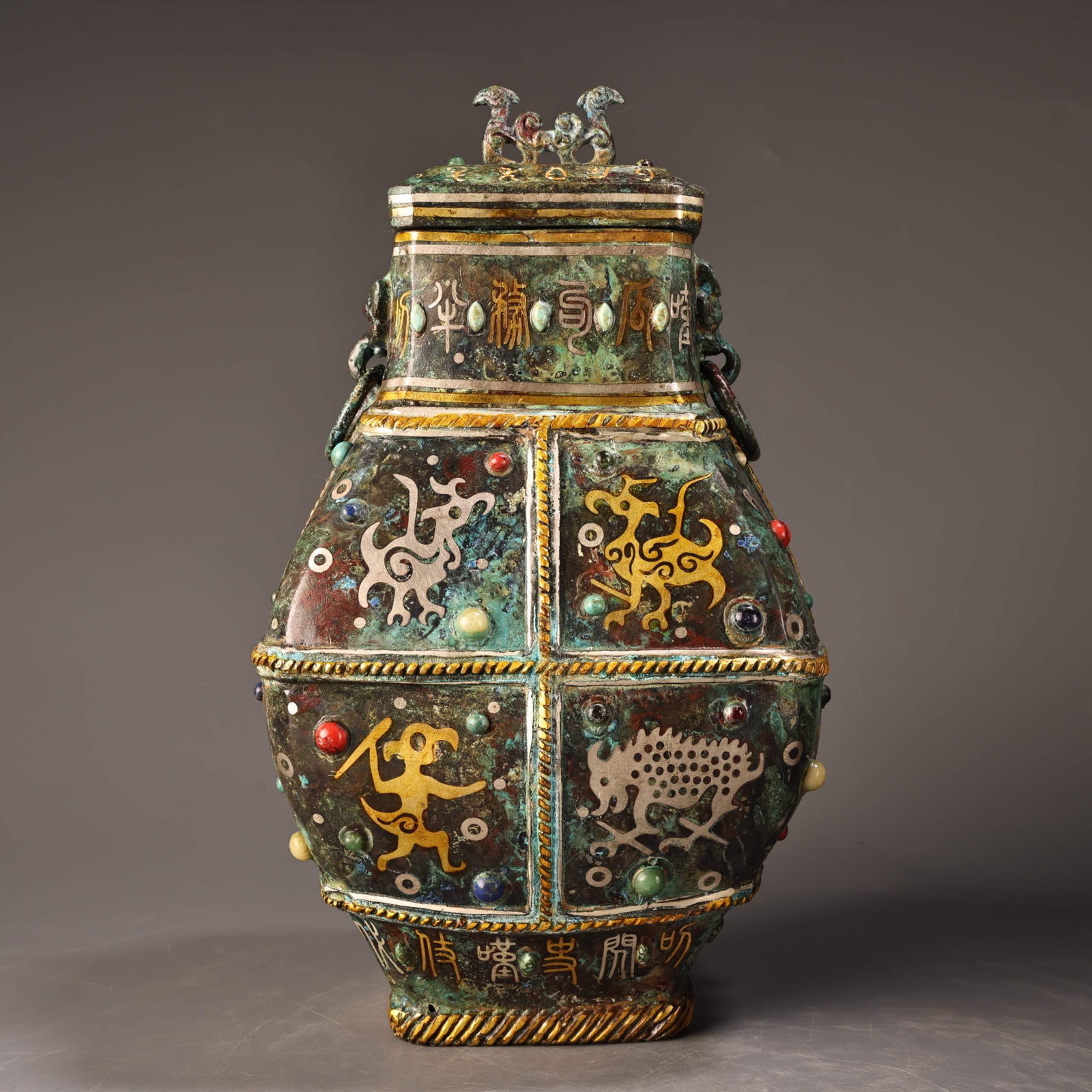 An Exquisite Bronze Inlaid Gold and Silver Beast Pattern Jar with Cover,Inlaid Gems,With Inscription: An Exquisite Bronze Inlaid Gold and Silver Beast Pattern Jar with Cover,Inlaid Gems,With Inscription,the Warring States period in China,Size:10.2inx5.9in,Weight:1600g 青铜错金&