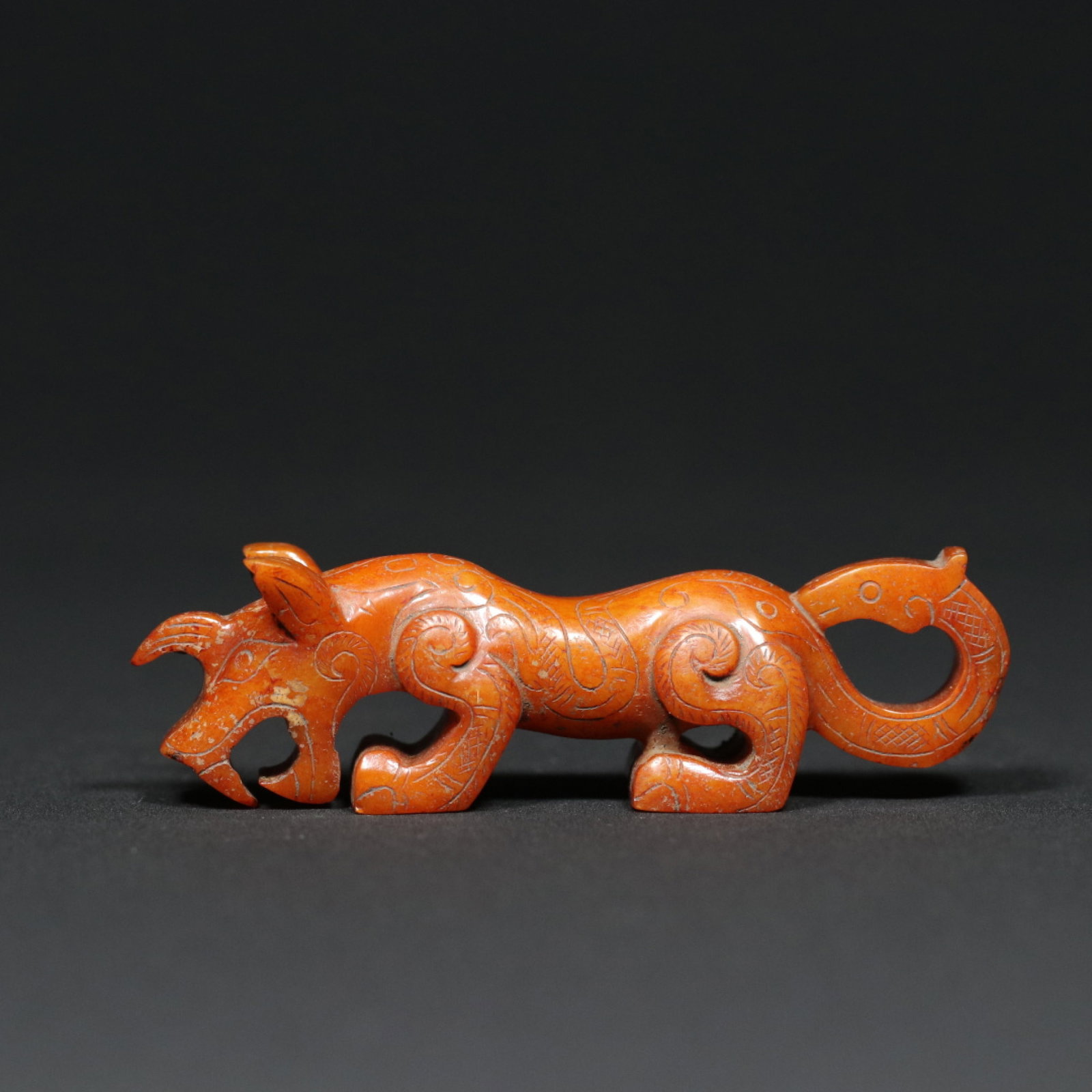 An Exquisite Archaic Jade Tiger Ornament: An Exquisite Archaic Jade Tiger Ornament,Han Dynasty,China,Size:3.1inx0.8inx0.9in,Weight:40g 高古玉老虎摆件,中国汉代