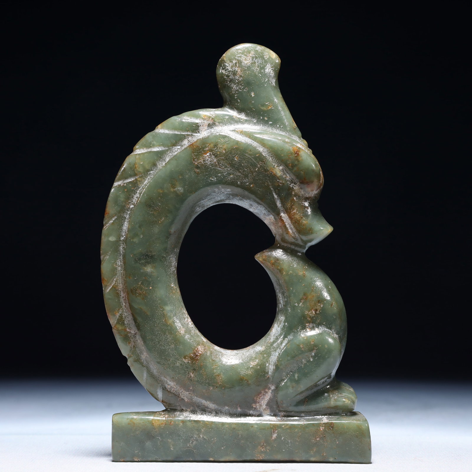 An Archaic Hongshan Culture Greenish Jade Beast Ornament: An Archaic Hongshan Culture Greenish Jade Beast Ornament,Ancient Time,China,Size:3.5inx0.8inx5.9in,Weight:300g 红山文化青白玉兽摆件,中