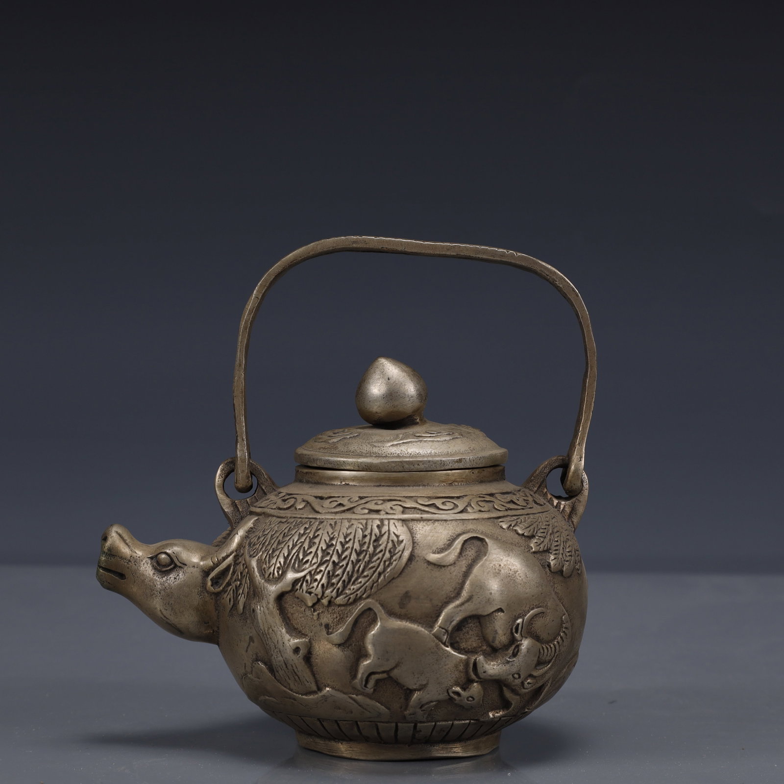 An Exquisite Silver-Plated Bronze Buffalo Pattern Ewer: An Exquisite Silver-Plated Bronze Buffalo Pattern Ewer,Ming Dynasty, China,Xuande Four-character Mark,Size:5.1inx3.9inx5.1in,Weight:500g 铜镀银牛纹执壶,ߑ