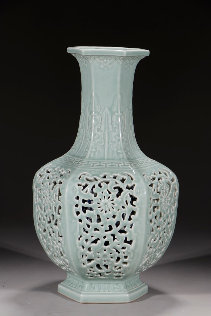 A Huge Celadon Glazed Hollow Lotus Pattern Vase: A Huge Celadon Glazed Hollow Lotus Pattern Vase,Qing Dynasty,China,Qianlong Six-character Mark,Size:15.7inx40.4inx5.6in 粉青釉镂空缠枝莲纹瓶