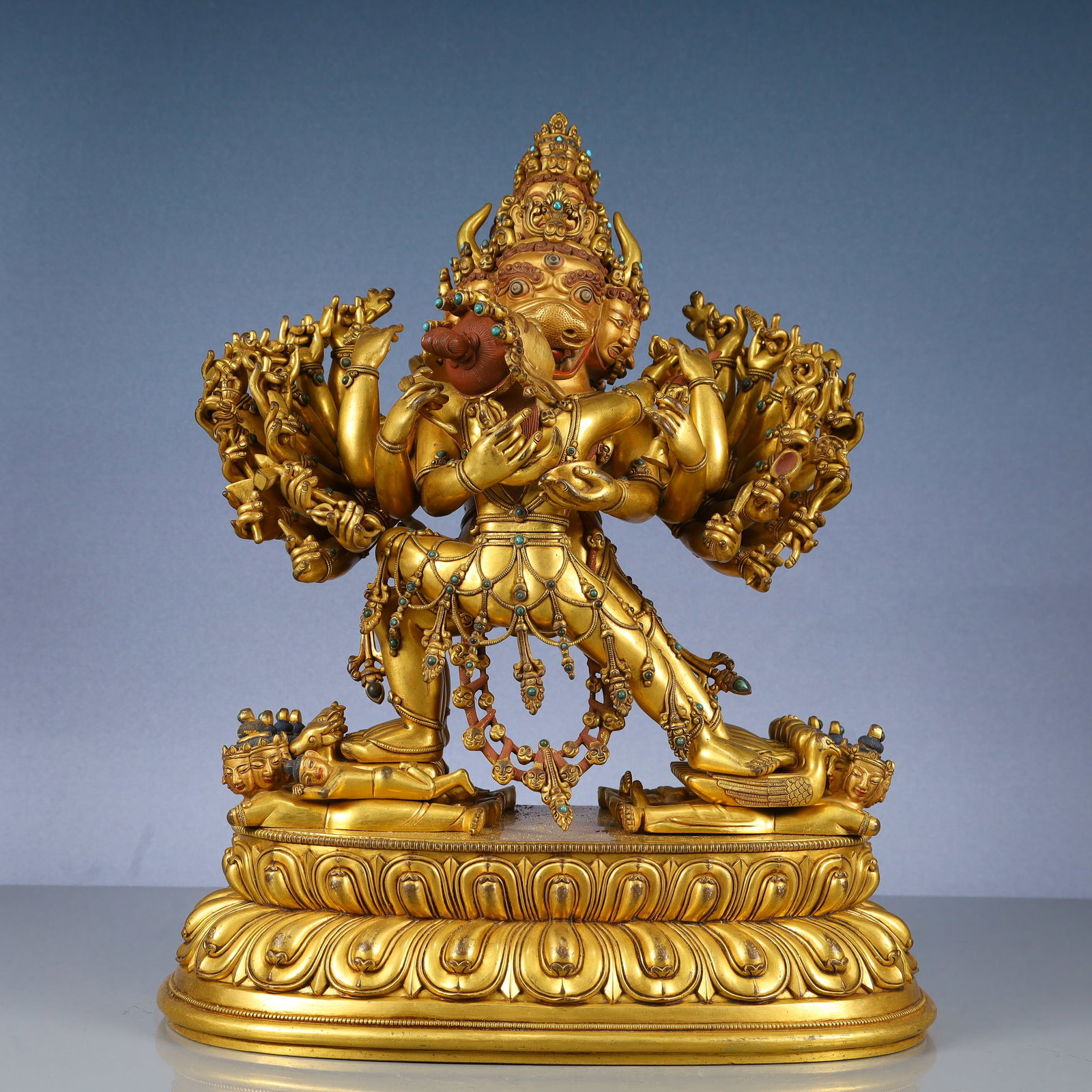 A Solemn Gilt Bronze Statue of Yamantaka,Inlaid Turquoise: A Solemn Gilt Bronze Statue of Yamantaka,Inlaid Turquoise,Qing Dynasty, China,Size:12.2inx7.9inx15.7in,Weight:16800g 铜鎏金大威德金刚像,嵌&#