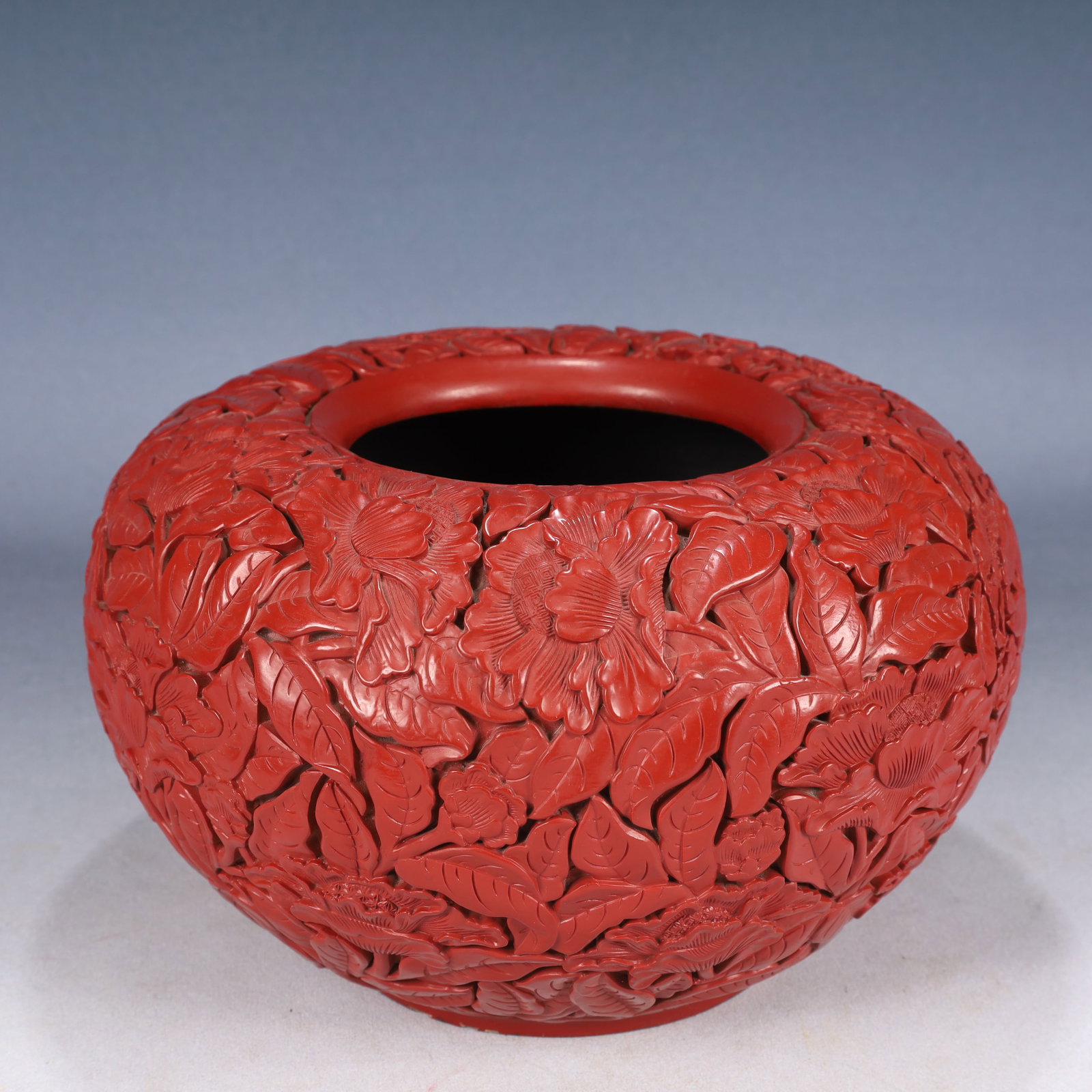 An Exquisite Carved Red Lacquer Flower Pattern Jar (1 of 8)