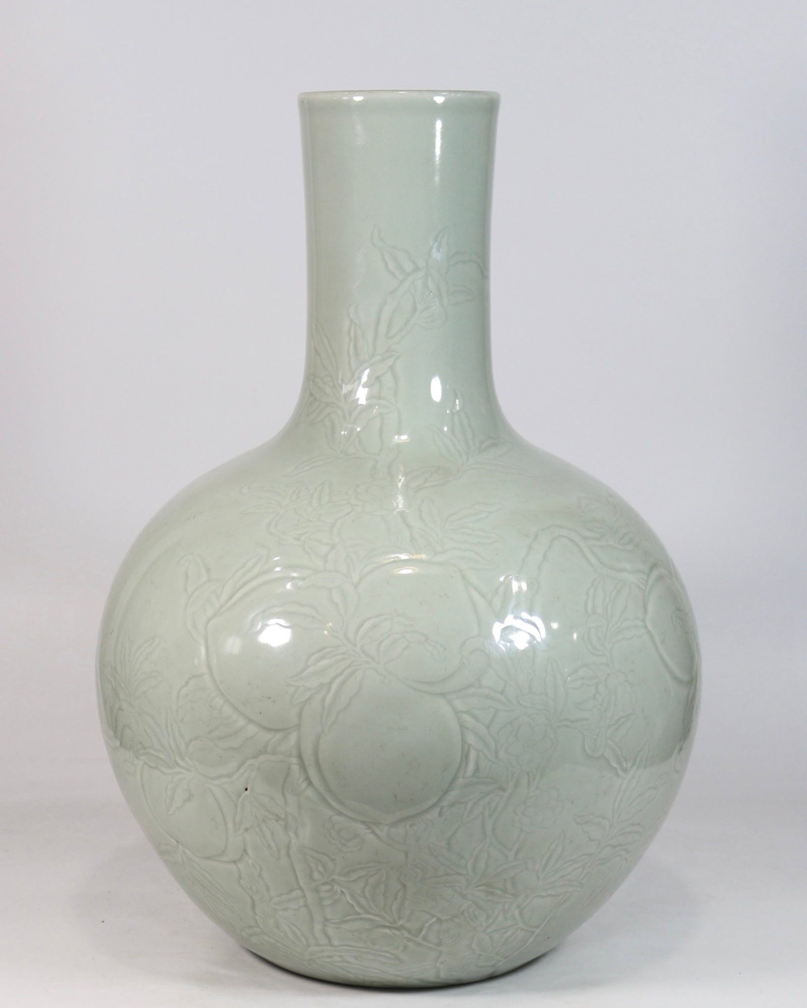A Huge Celadon Glazed Bats and Peach Pattern Vase: A Huge Celadon Glazed Bats and Peach Pattern Vase,Qing Dynasty,China,Qianlong Six-character Mark,Size:20.3inx12.8in 豆青釉蝙蝠桃子纹瓶,中