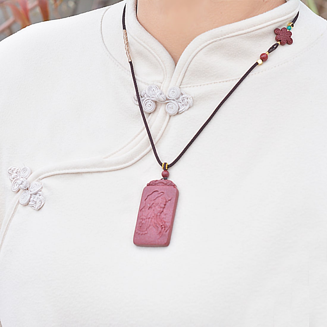 An Exquisite Cinnabar Dragon Pattern Pendant with Statue of Guangong (1 of 6)