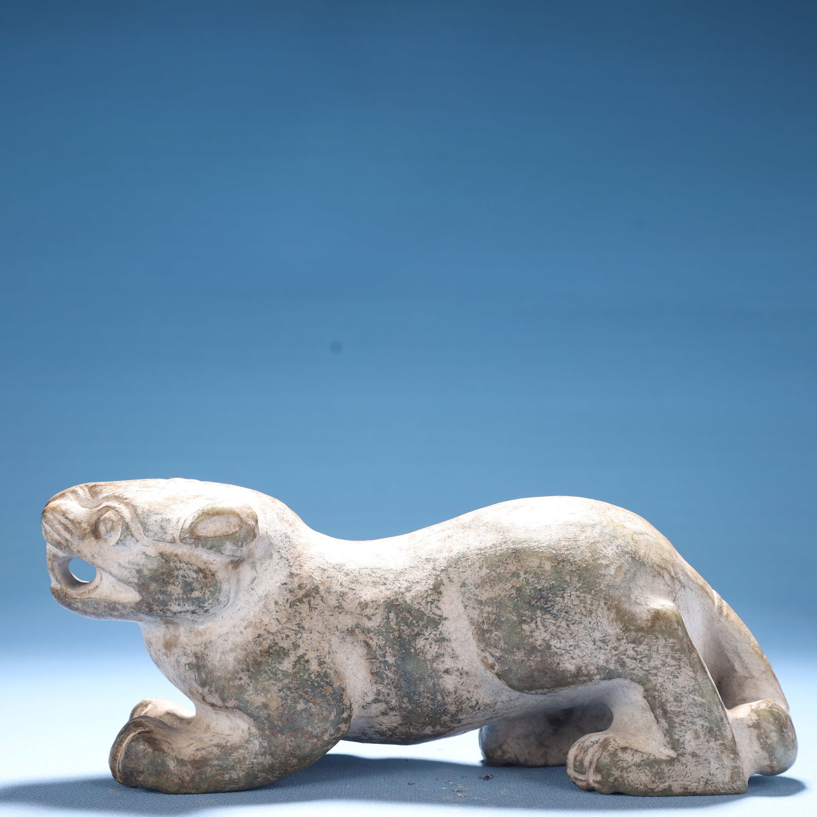 An Archaic Hongshan Culture Greenish Jade Tiger Ornament: An Archaic Hongshan Culture Greenish Jade Tiger Ornament,Ancient Time,China,Size:7.9inx2.4inx3.1in,Weight:1250g 红山文化青白玉虎摆件,中