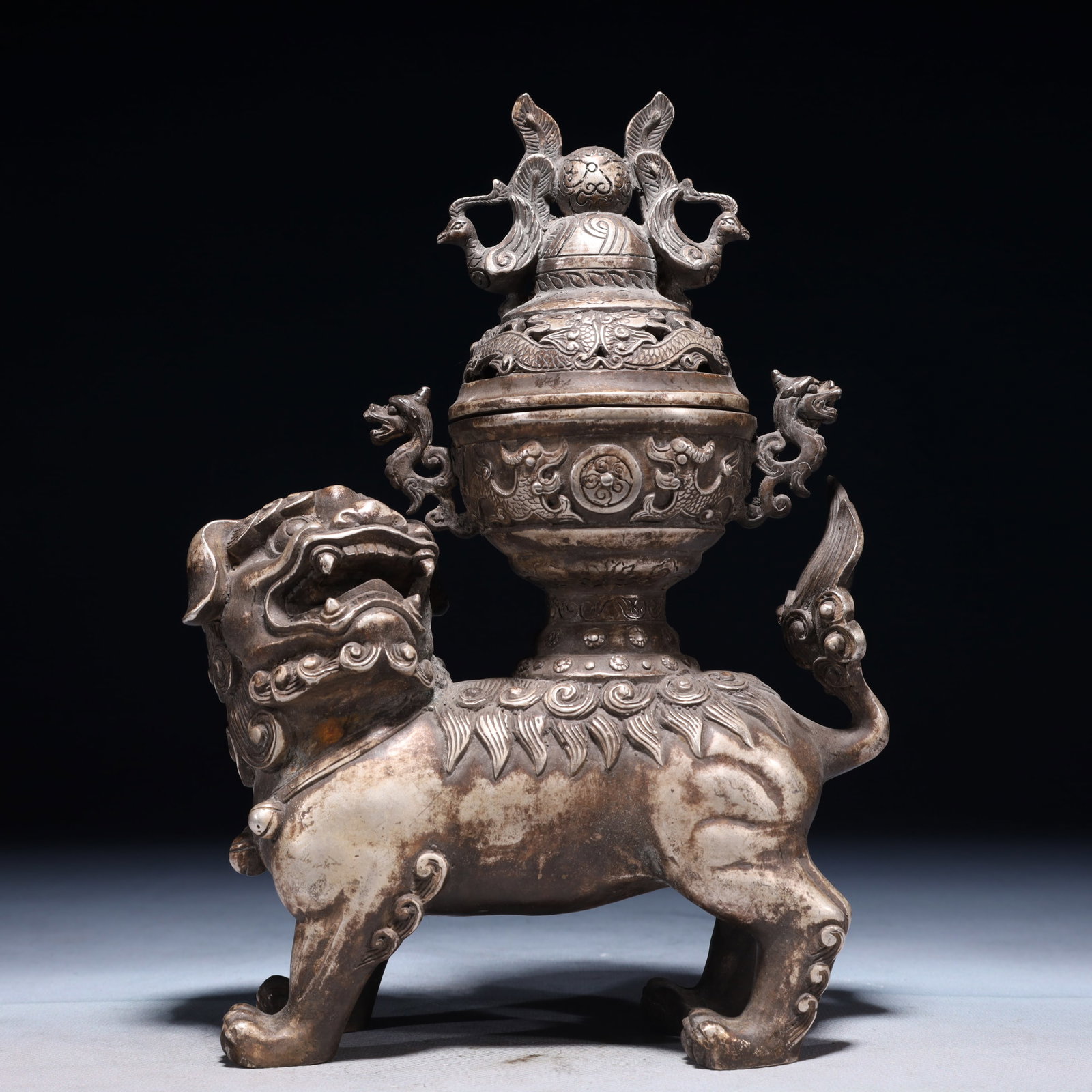 An Exquisite Silver-plated Bronze Dragon Pattern Lion Censer: An Exquisite Silver-plated Bronze Dragon Pattern Lion Censer,Qing Dynasty,China,Size:7.1inx3.1inx9.4in,Weight:1450g 铜镀银龙纹狮子香炉,中
