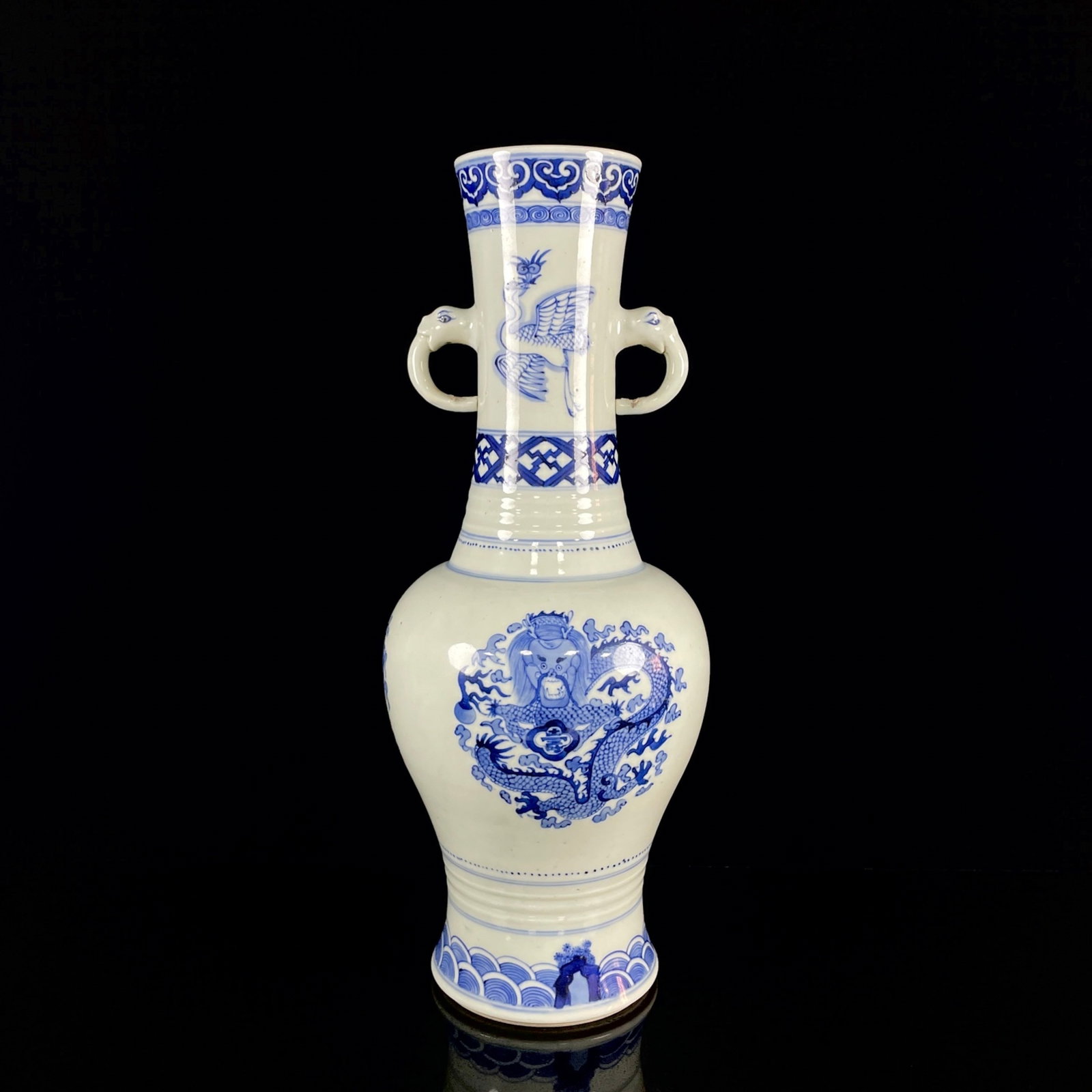 A Huge Blue and White Flower and Dragon Pattern Double-Ears Vase: A Huge Blue and White Flower and Dragon Pattern Double-Ears Vase,Qing Dynasty,China,Kangxi Six-character Mark,Size:16.5inx7.1in 青花花卉龙纹双耳瓶