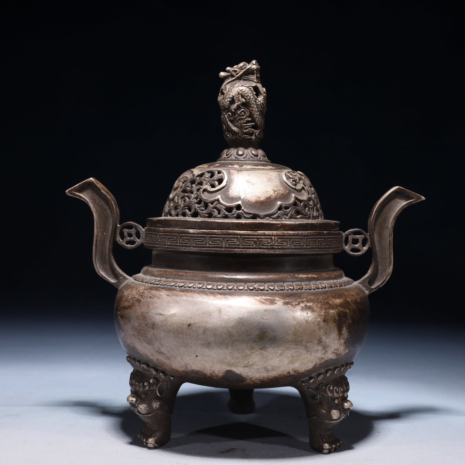 An Exquisite Silver-plated Bronze Lotus Pattern Double-Ears and Tripod Censer: An Exquisite Silver-plated Bronze Lotus Pattern Double-Ears and Tripod Censer,Qing Dynasty,China,Qianlong Four-character Mark,Size:8.3inx5.5inx9.1in,Weight:1500g 铜镀银缠ੜ