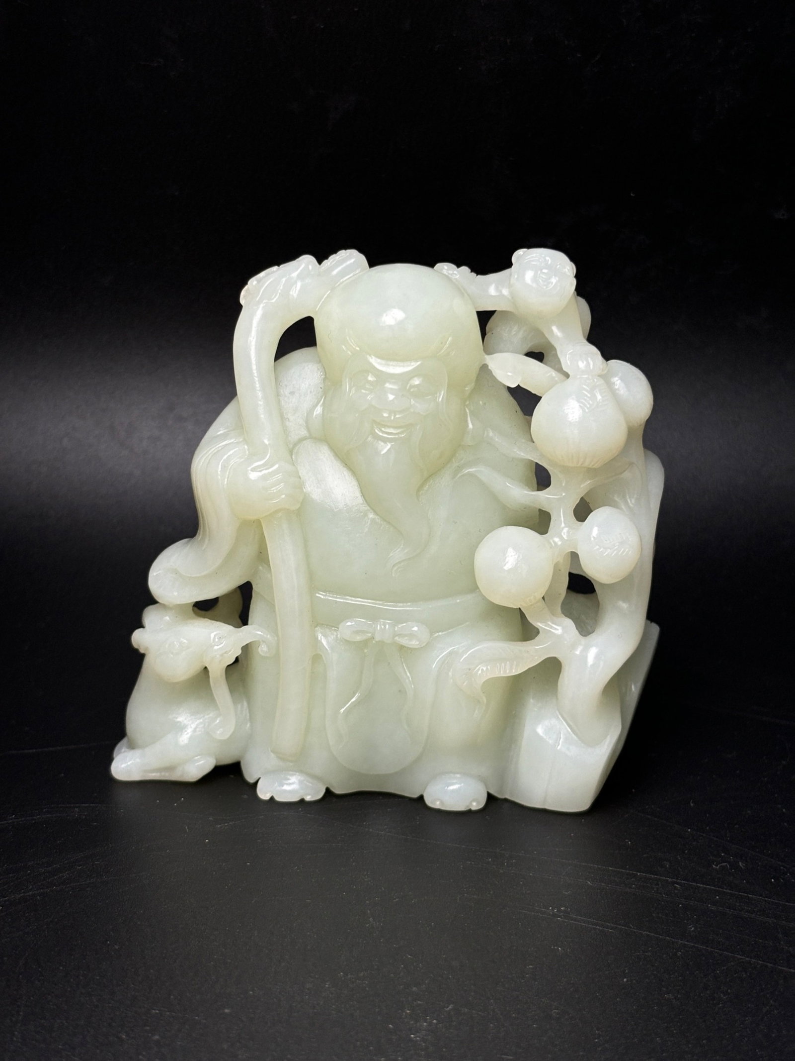 An Exquisite White Jade Figure Ornament: An Exquisite White Jade Figure Ornament,Qing Dynasty,China,Size:3.9inx3.6inx1.4in,Weight:369g 白玉人物摆件,中国清代