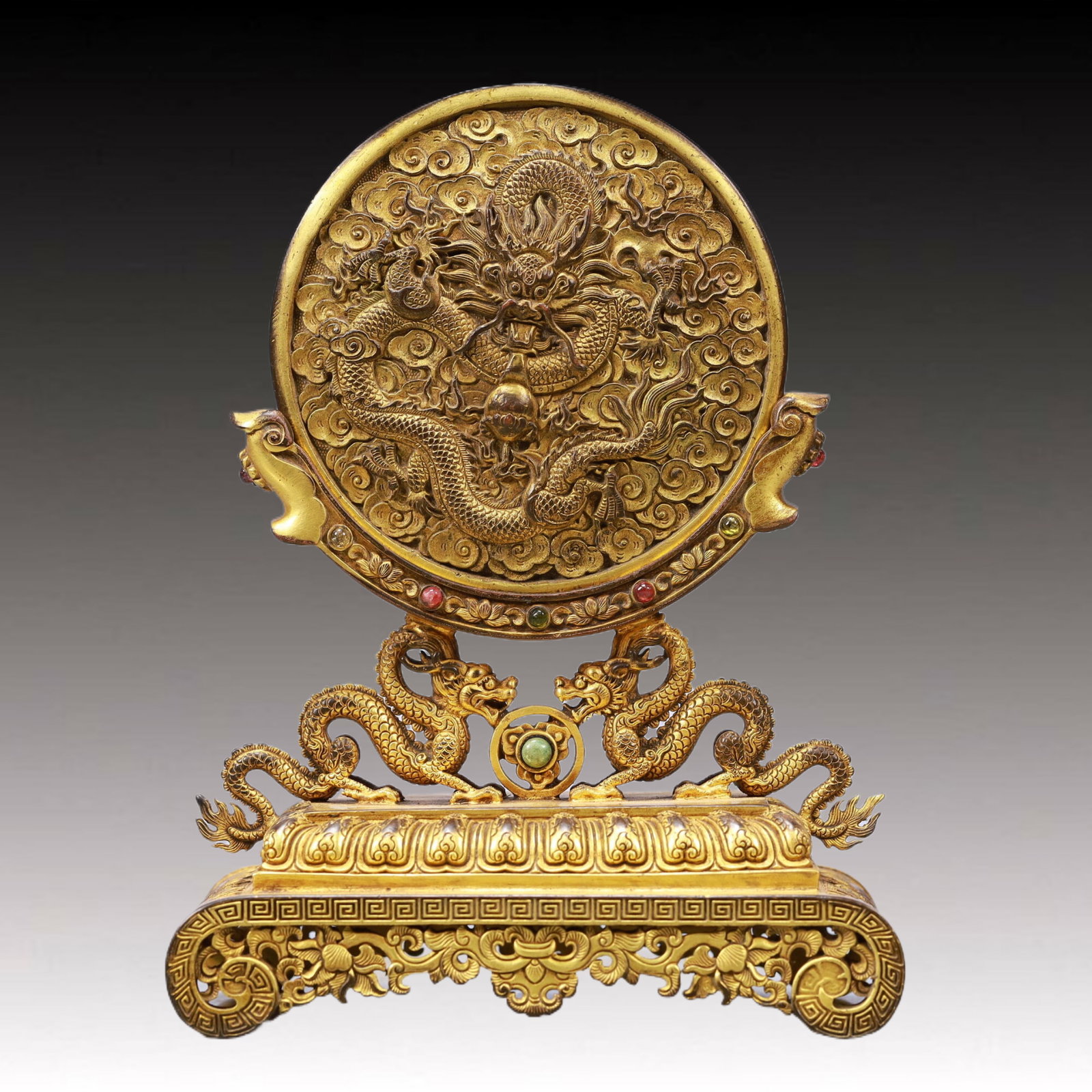 An Exquisite Gilt Bronze Inlaid Gems Auspicious Cloud and Dragon Pattern Table Screen: An Ecmxquisite Gilt Bronze Inlaid Gems Auspicious Cloud and Dragon Pattern Table Screen,Qing Dynasty, China,Qianlong Four-character Mark,Size:5.3inx3.3inx7.5inWeight:1000g 铜鎏金
