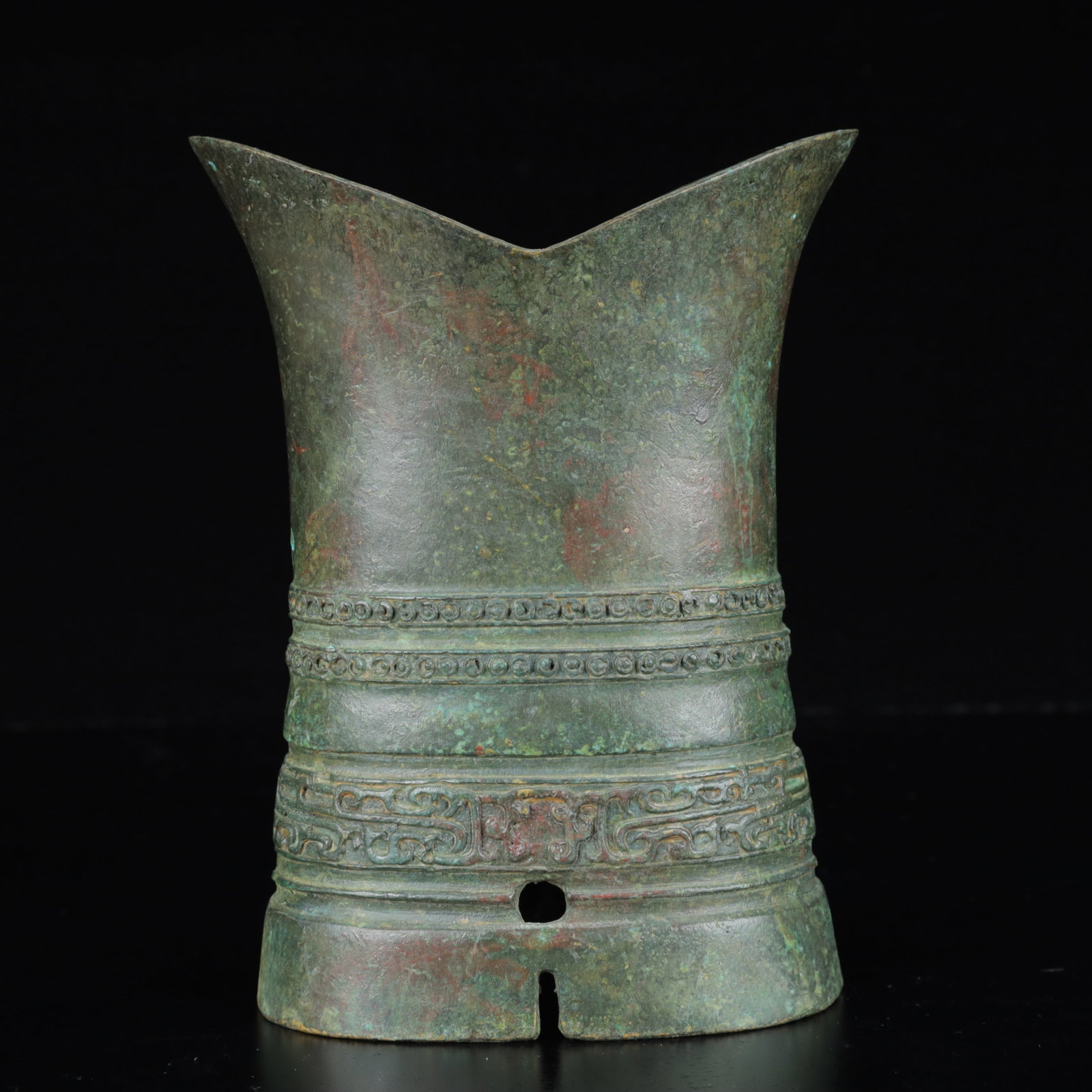 An Archaic Bronze Beast-Face Pattern Libation Cup (1 of 14)