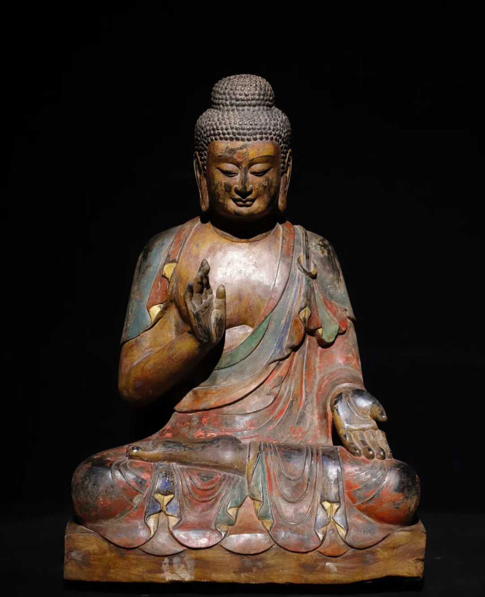A Solemn Limestone Painted Color Statue of Sakyamuni: A Solemn Limestone Painted Color Statue of Sakyamuni,Tang Dynasty,China,Size:26.8inx18.5inx12.6in 青石彩绘释迦摩尼像,中国唐É