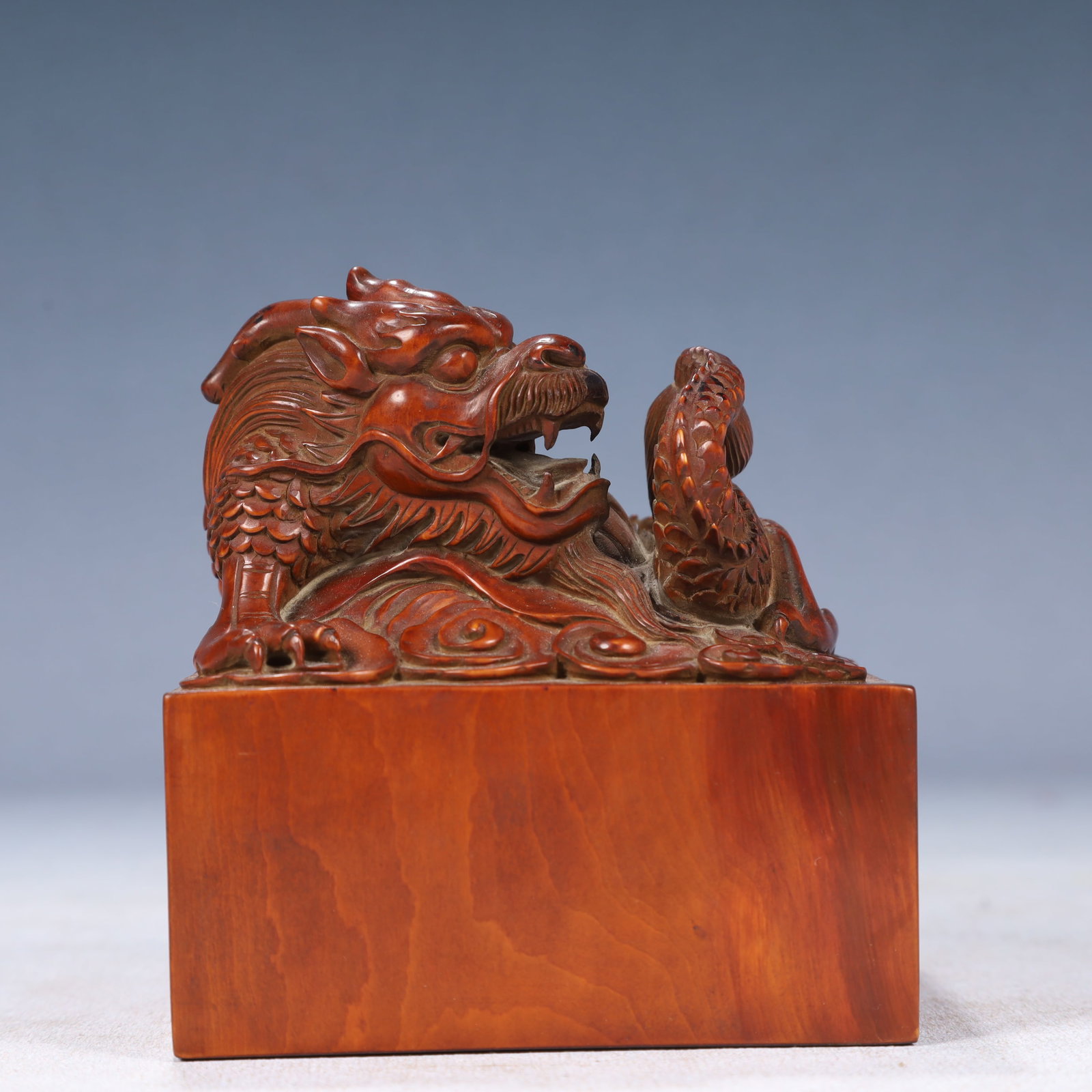 An Exquisite Boxwood Auspicious Cloud and Dragon Pattern Seal: An Exquisite Boxwood Auspicious Cloud and Dragon Pattern Seal,Qing Dynasty, China,Size:3.7inx3.9in,Weight:550g 黄杨木祥云龙纹印章,中国