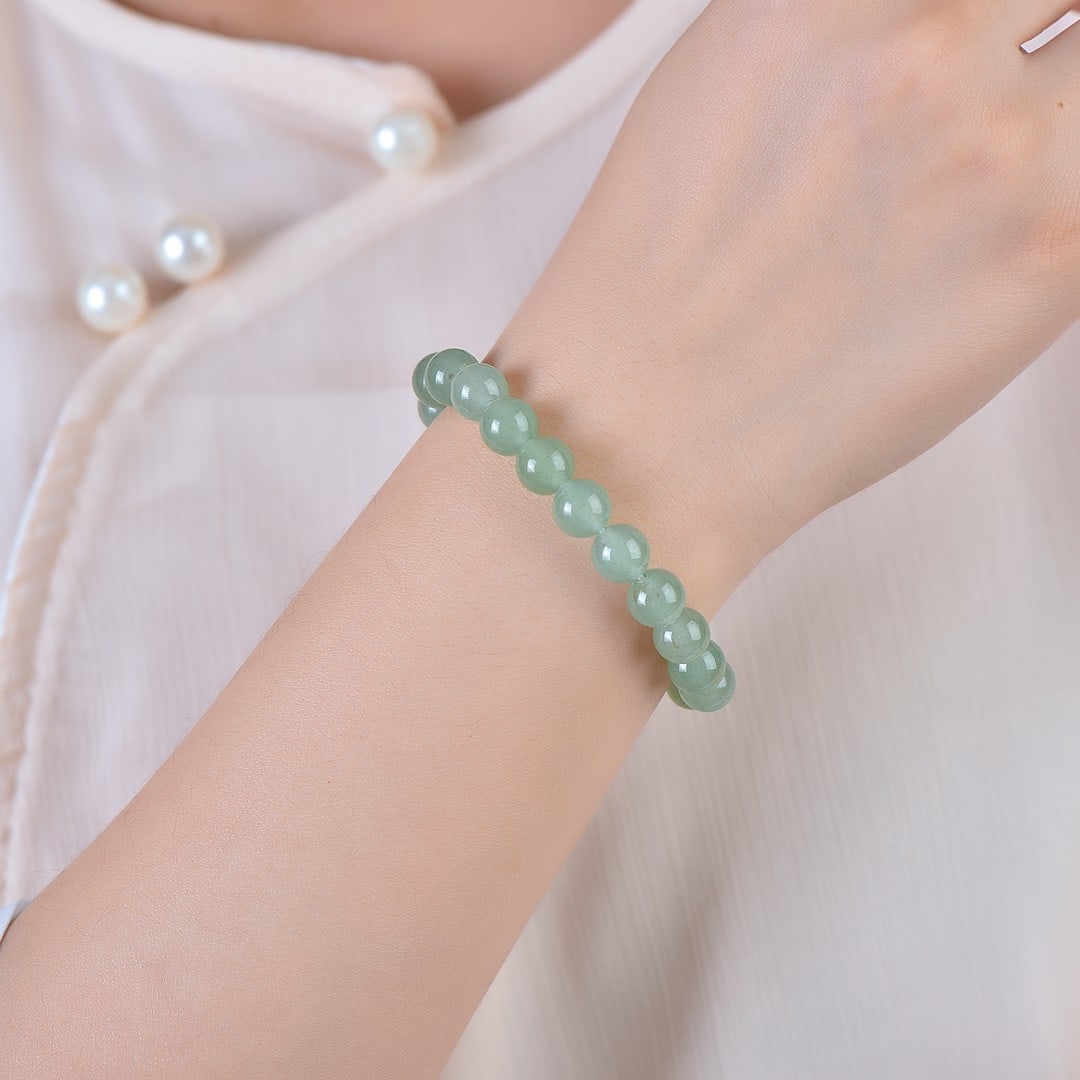 An Exquisite Greenish Jade Bracelets: An Exquisite Greenish Jade Bracelets,Size:0.3inx0.3in 青玉手串