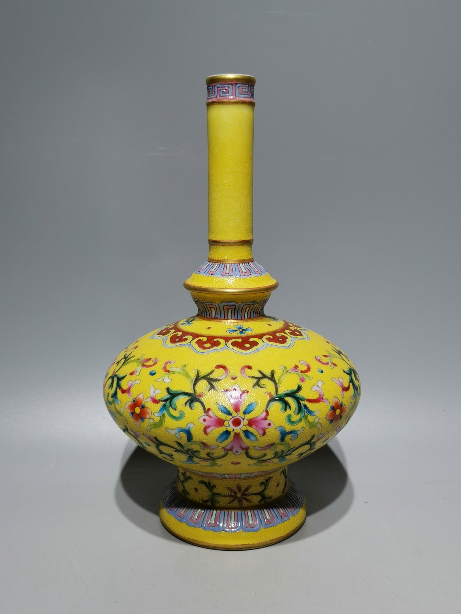 An Exquisite Yellow Ground Famille-Rose Lotus Pattern Vase: An Exquisite Yellow Ground Famille-Rose Lotus Pattern Vase,Qing Dynasty,China,Qianlong Six-character Mark,Size:8.9inx5.3in