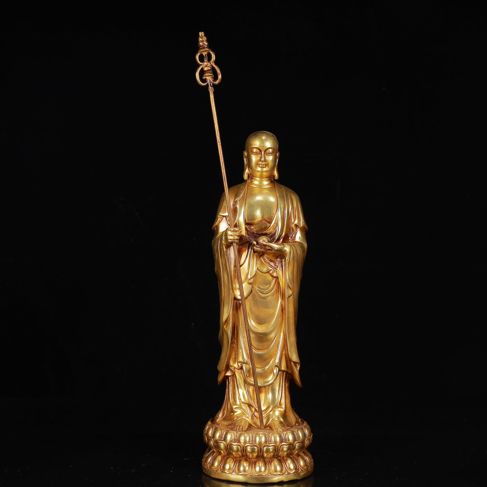 An Exquisite Gilt Bronze Statue of Kshitigarbha Bodhisattva: An Exquisite Gilt Bronze Statue of Kshitigarbha Bodhisattva,Qing Dynasty,China,Qianlong Four-Character Mark,Size:3.5inx13.8in,Weight:2050g 铜鎏金地藏王像,