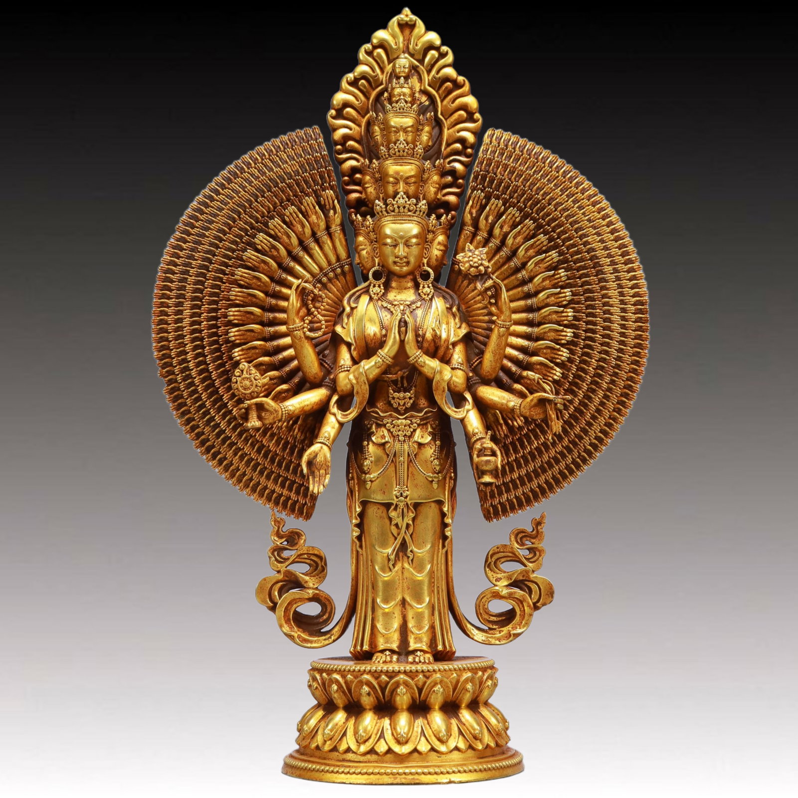 A Solemn Gilt Bronze Statue of Thousand-hand Guanyin: A Solemn Gilt Bronze Statue of Thousand-hand Guanyin,Ming Dynasty, China,Yongle Six-character Mark,Size:8.7inx3.9inx13.4in,Weight:4100g 铜鎏金千手观音像