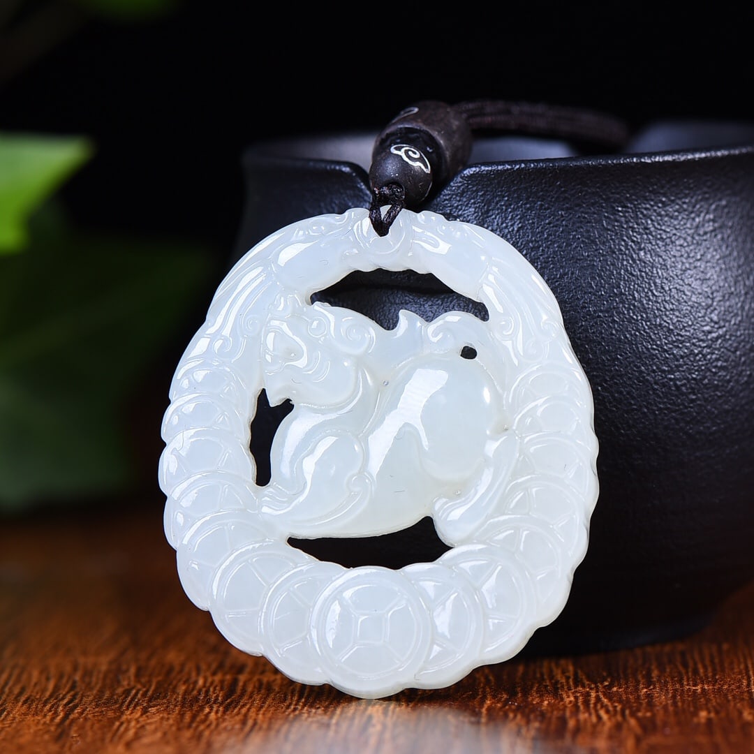 An Exquisite White Jade Wealth-Attracting Creature Pendant: An Exquisite White Jade Wealth-Attracting Creature Pendant,Size:1.6inx1.8in 白玉貔貅挂件