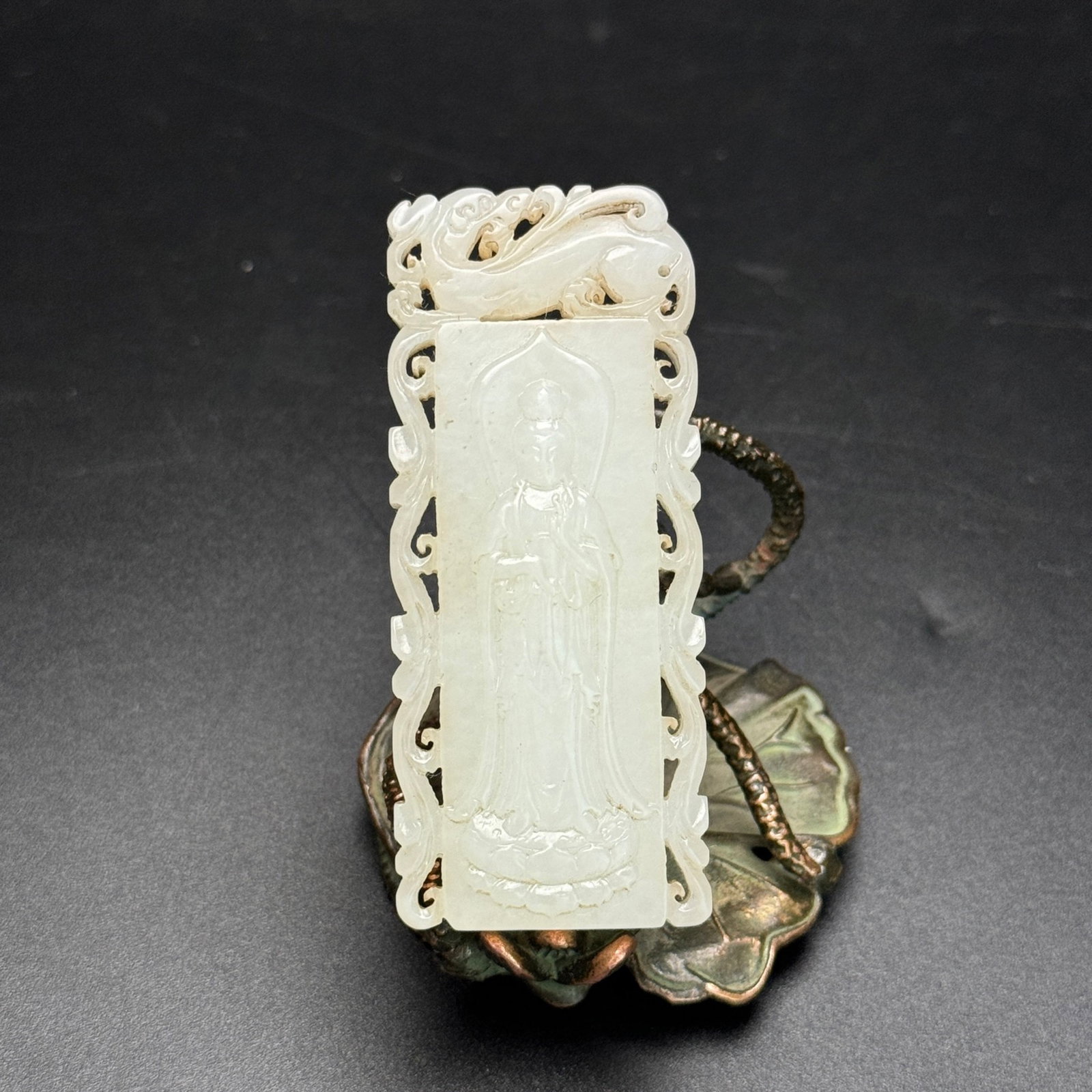 An Exquisite White Jade Statue of Avalokitesvara Pendant: An Exquisite White Jade Statue of Avalokitesvara Pendant,Qing Dynasty,China,Size:1.1inx2.6inx0.3in,Weight:32g 白玉观音像牌,中国清代