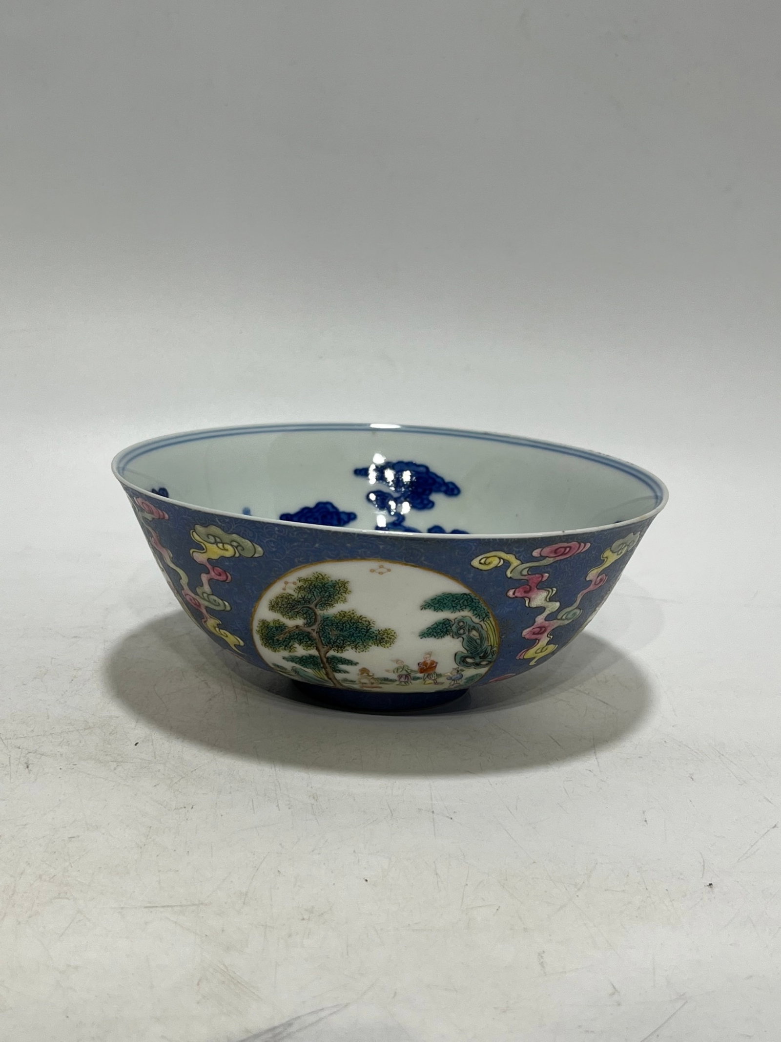 An Exquisite Blue and White Blue Ground Famille-Rose Painted Gold Auspicious Cloud and Figure (1 of 8)