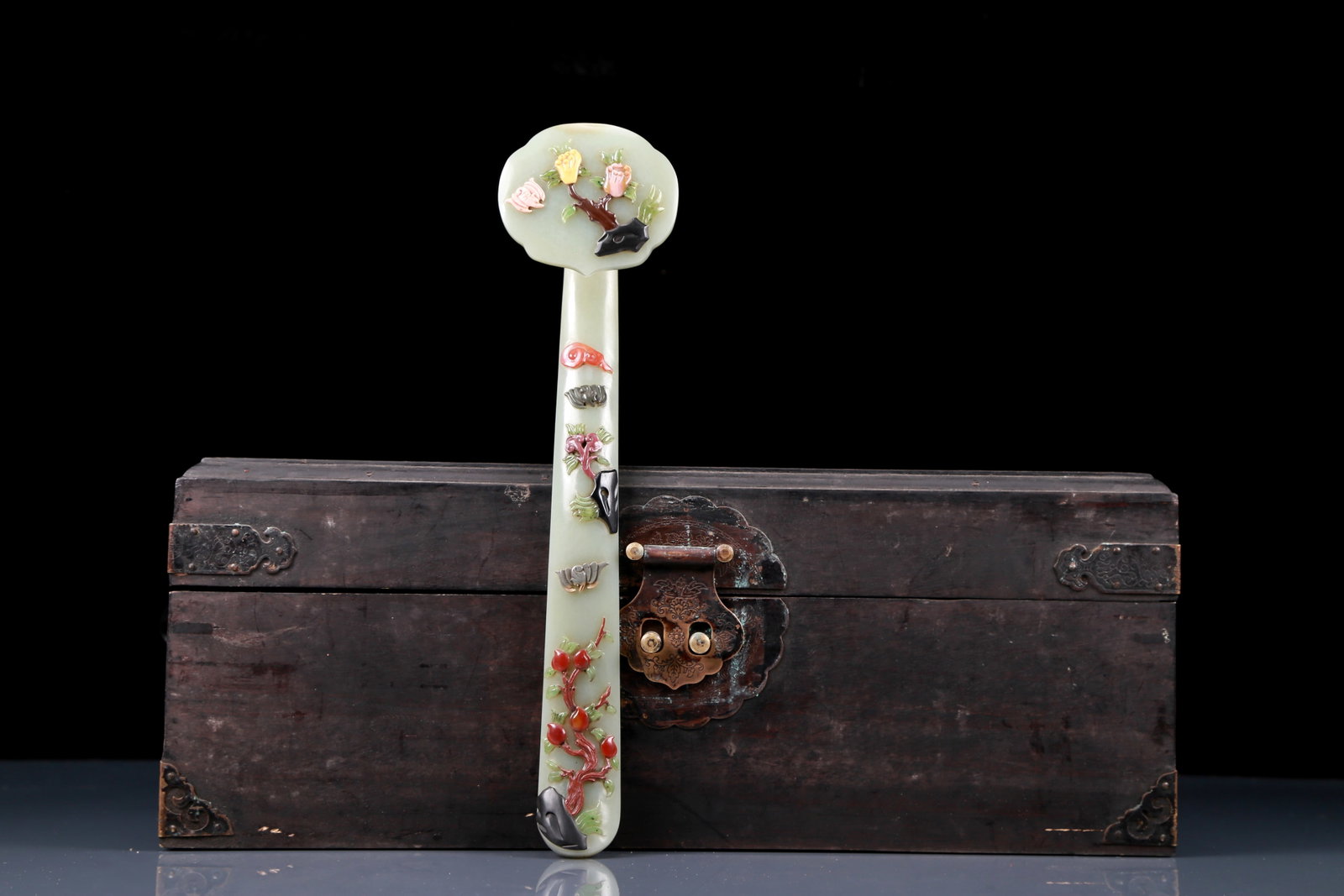 An Exquisite Greenish Jade Bats and Peach Pattern Ruyi with Bats Pattern Box: An Exquisite Greenish Jade Bats and Peach Pattern Ruyi with Bats Pattern Box，Qing Dynasty, China，Qianlong Four-character Mark，Size:Ruyi2.8inx1.6inx11.4in，Box15.7inx7.9inx6.