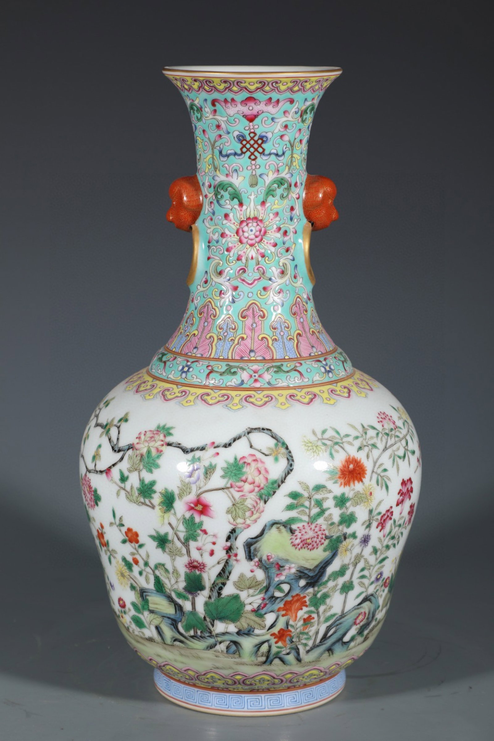 An Exquisite Turquoise Glazed Famille-Rose Flower Pattern Beast-Ears Vase: An Exquisite Turquoise Glazed Famille-Rose Flower Pattern Beast-Ears Vase,Qing Dynasty,China,Qianlong Six-character Mark,Size:13.4inx7.5in
