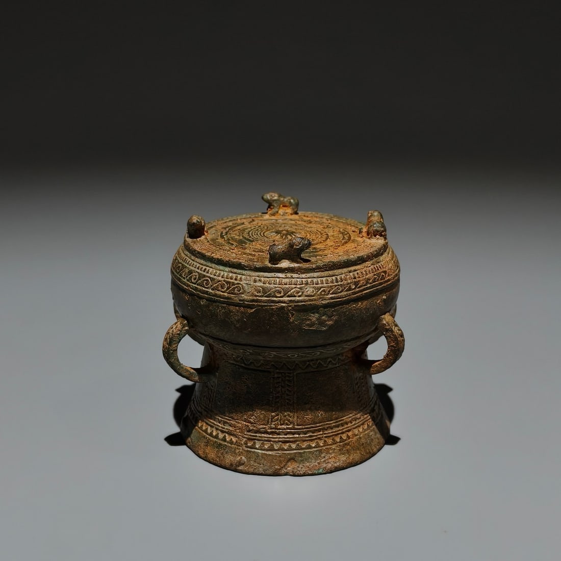 An Archaic Bronze Ornament: An Archaic Bronze Ornament,the Warring States period in China,Size:2.4inx2.4in 青铜摆件,中国战国时期