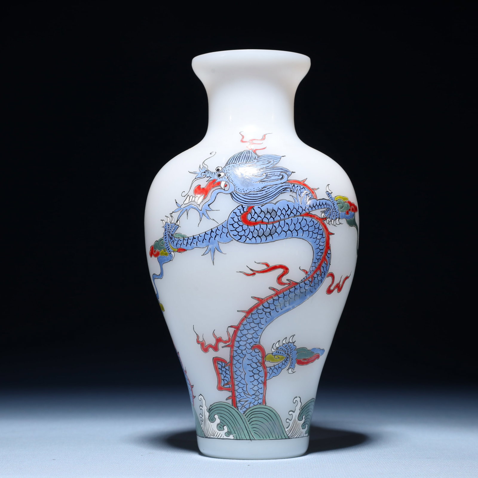 An Exquisite Glass Seawater and Dragon Pattern Vase: An Exquisite Glass Seawater and Dragon Pattern Vase,Qing Dynasty,China,Qianlong Four-character Mark,Size:3.5inx7.9in,Weight:514g 琉璃海水龙纹瓶,中ࢲ