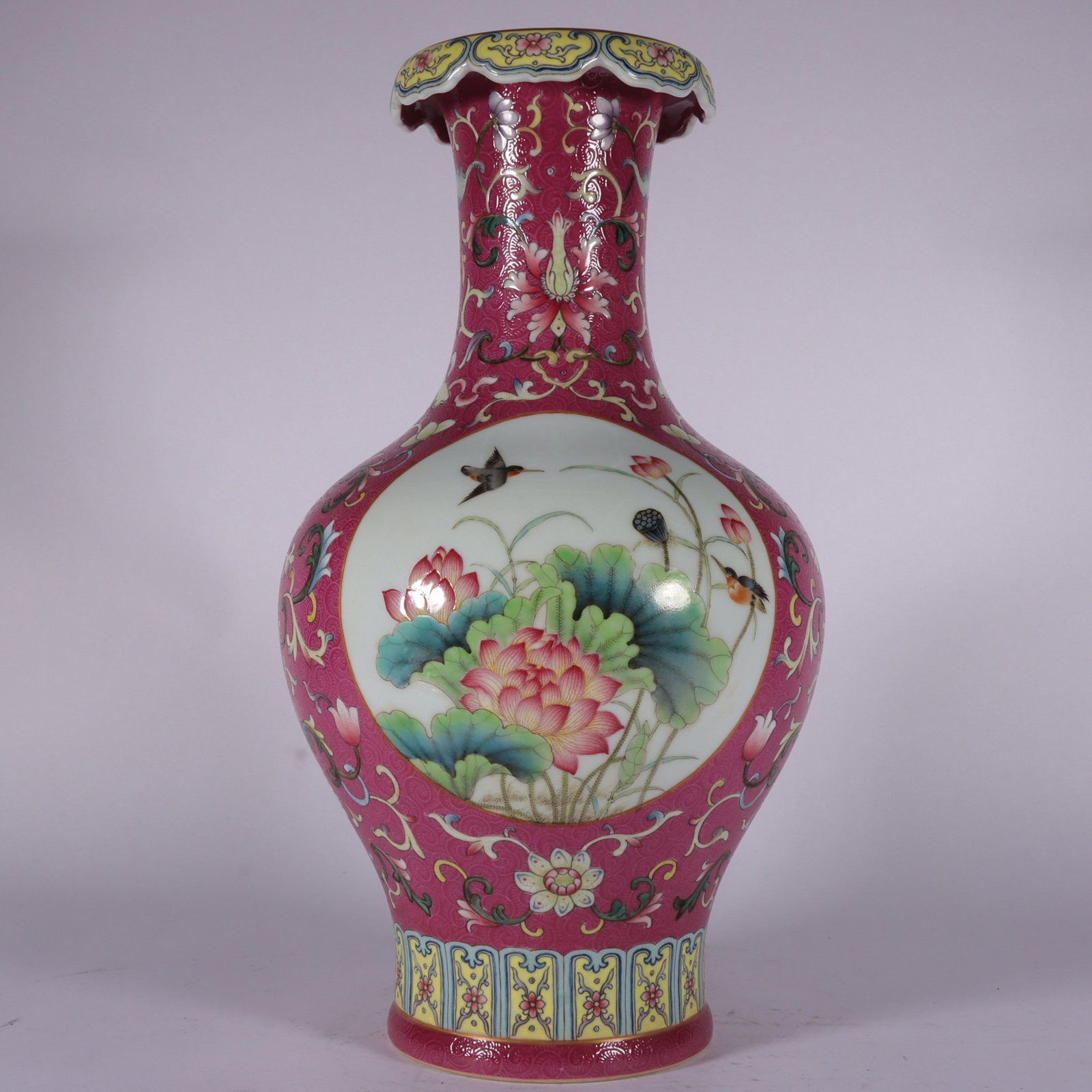 A Rare Famille-Rose Ruby Red-Glazed Flower and Bird Pattern Vase: A Rare Famille-Rose Ruby Red-Glazed Flower and Bird Pattern Vase,Qing Dynasty,China,Qianlong Six-character Mark,Size:13.2inx7.1in 粉彩胭脂红花鸟纹ல